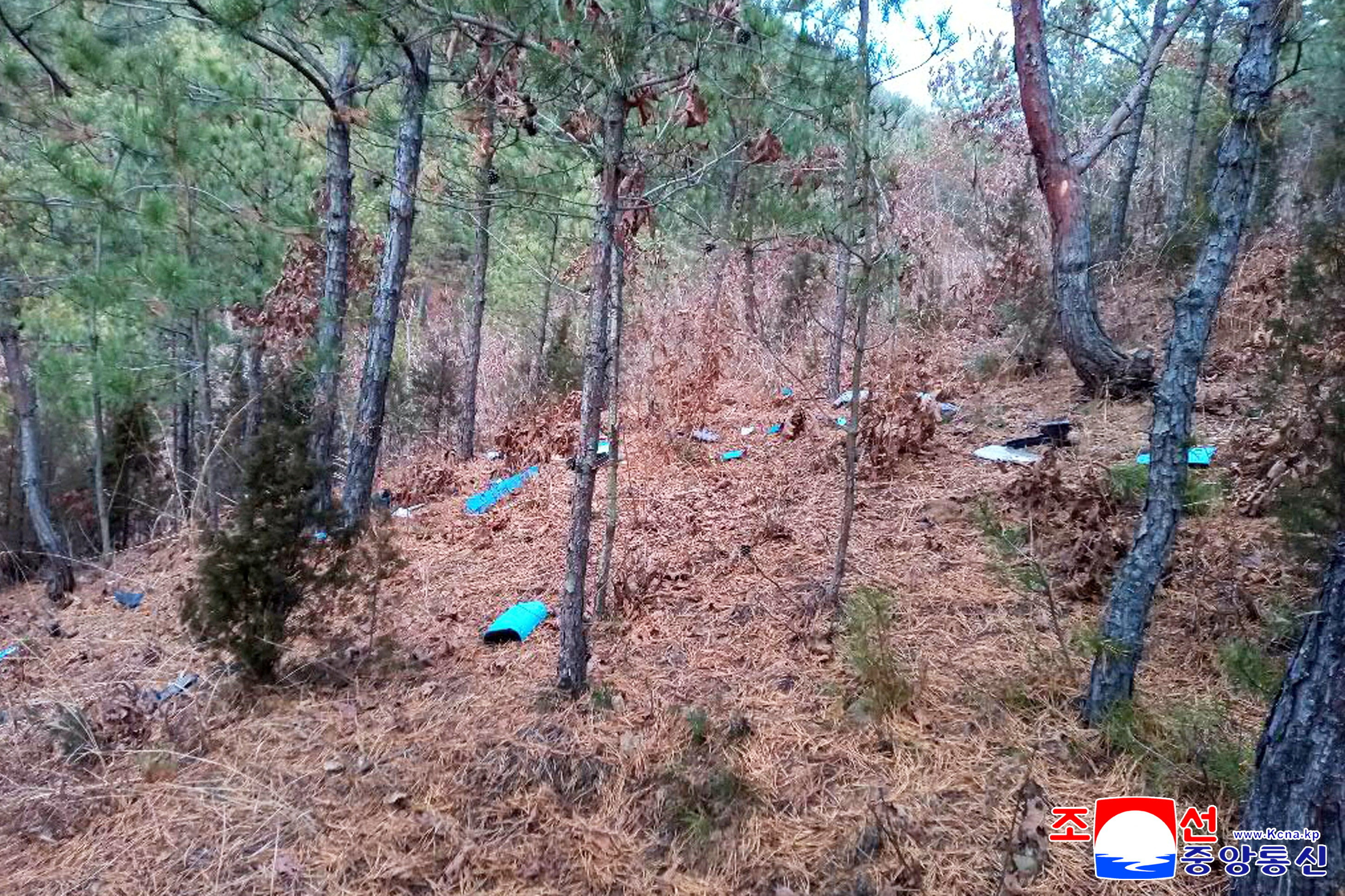 Fragments of a drone lie scattered on the ground in Muksan-ri area, Kaepung District, Kaesong City, North Korea, after North Korea said on Saturday that South Korea sent another drone into North Korean airspace on January 4, according to North Korean state media KCNA, in this picture released by North Korea's official Korean Central News Agency on January 10, 2026. KCNA via REUTERS ATTENTION EDITORS - THIS IMAGE WAS PROVIDED BY A THIRD PARTY. REUTERS IS UNABLE TO INDEPENDENTLY VERIFY THIS IMAGE. NO THIRD PARTY SALES. SOUTH KOREA OUT. NO COMMERCIAL OR EDITORIAL SALES IN SOUTH KOREA.