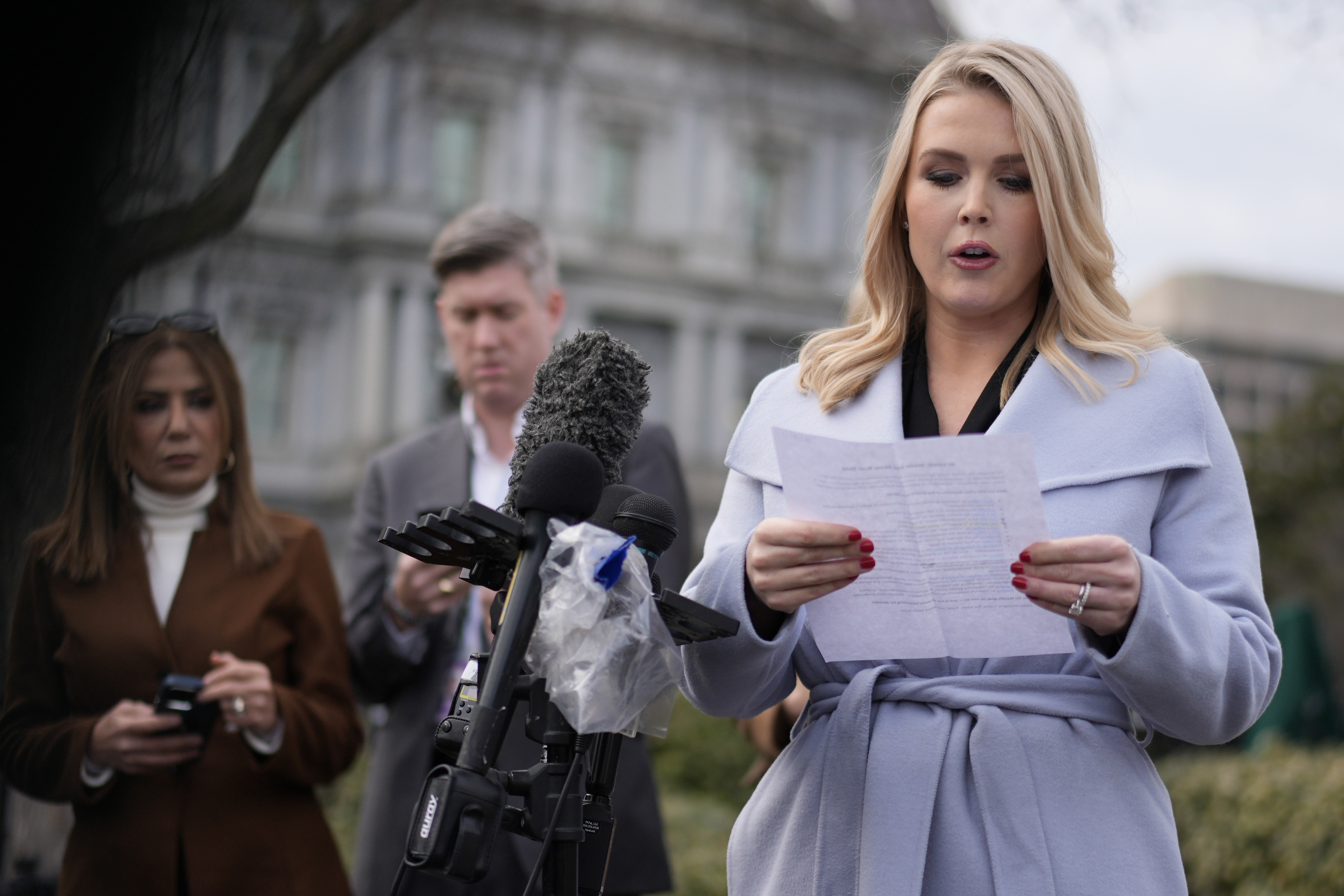 Karolyn Leavitt speaks to reporters outside the White House