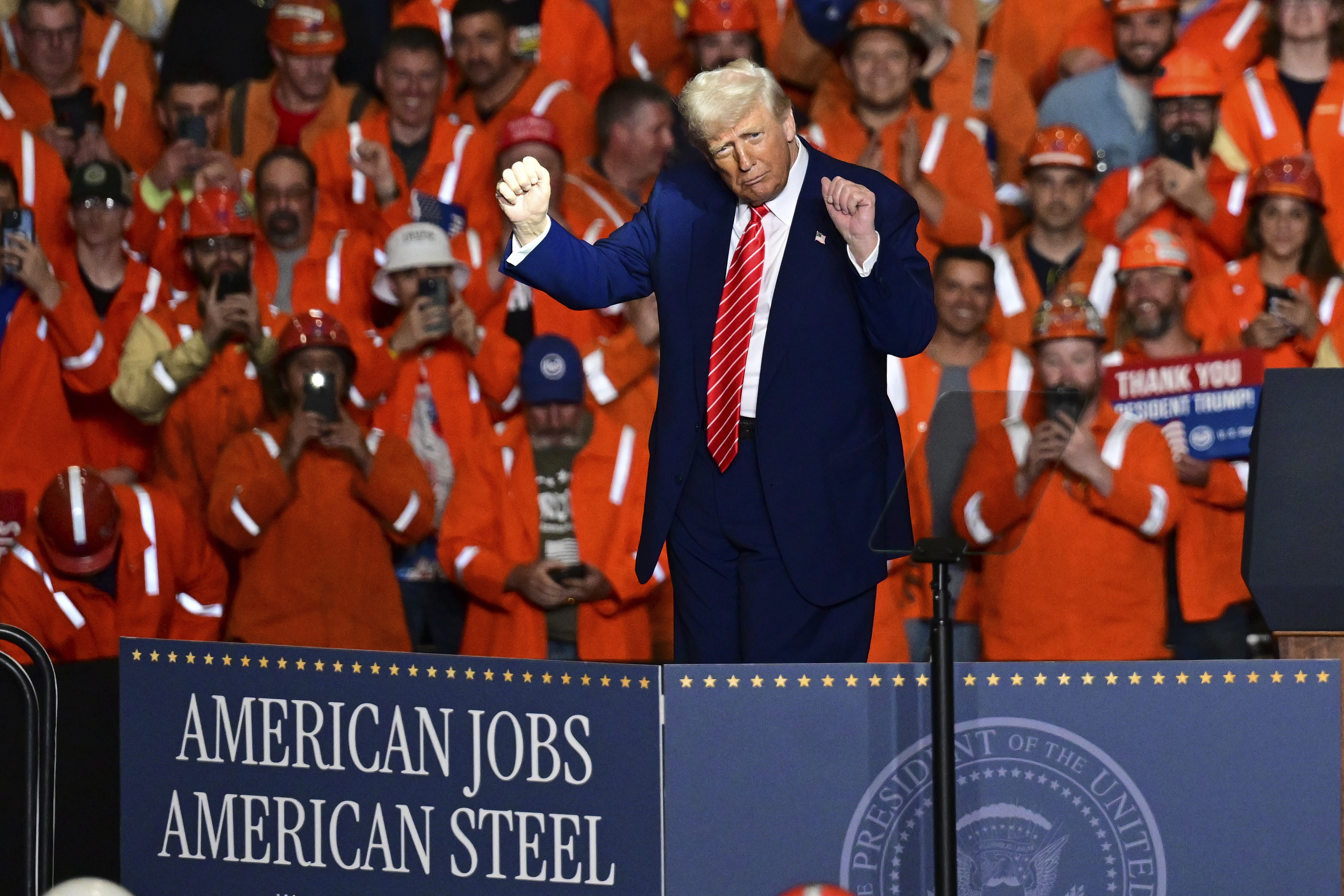 Donald Trump dances in front of US Steel workers