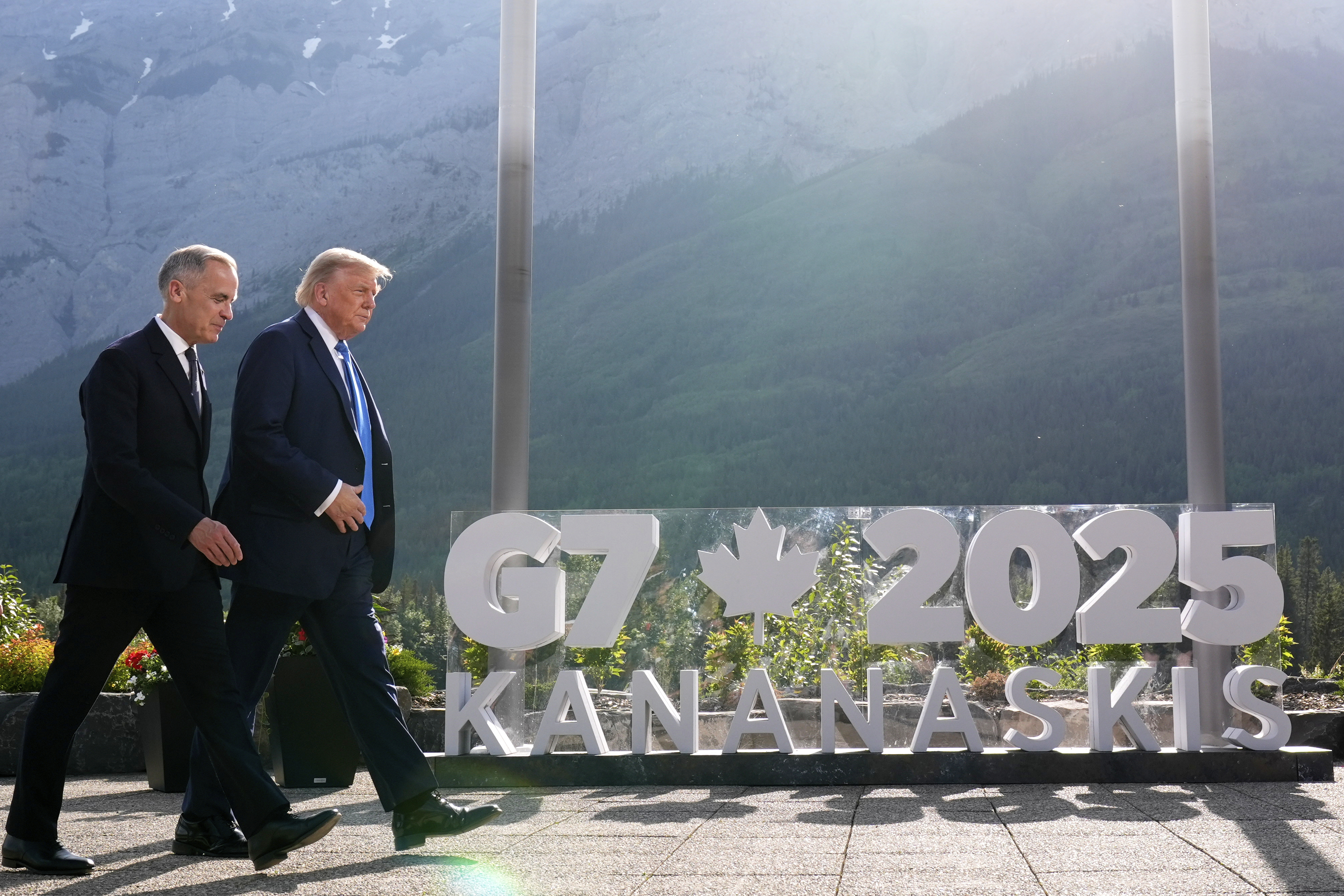 Trump and Mark Carney at the G7 summit in Canada