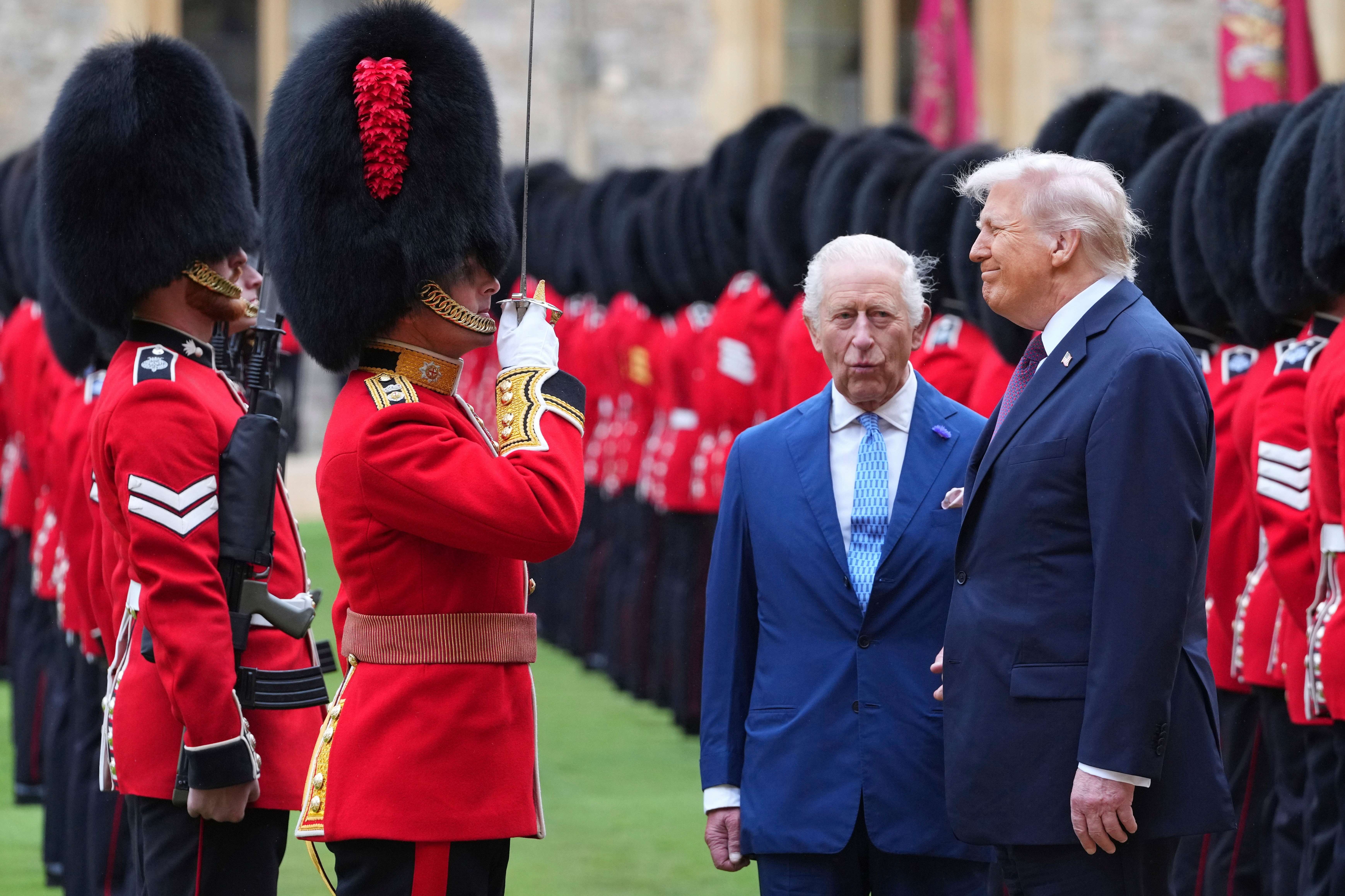 Donald Trump walks with King Charles to inspect the guards