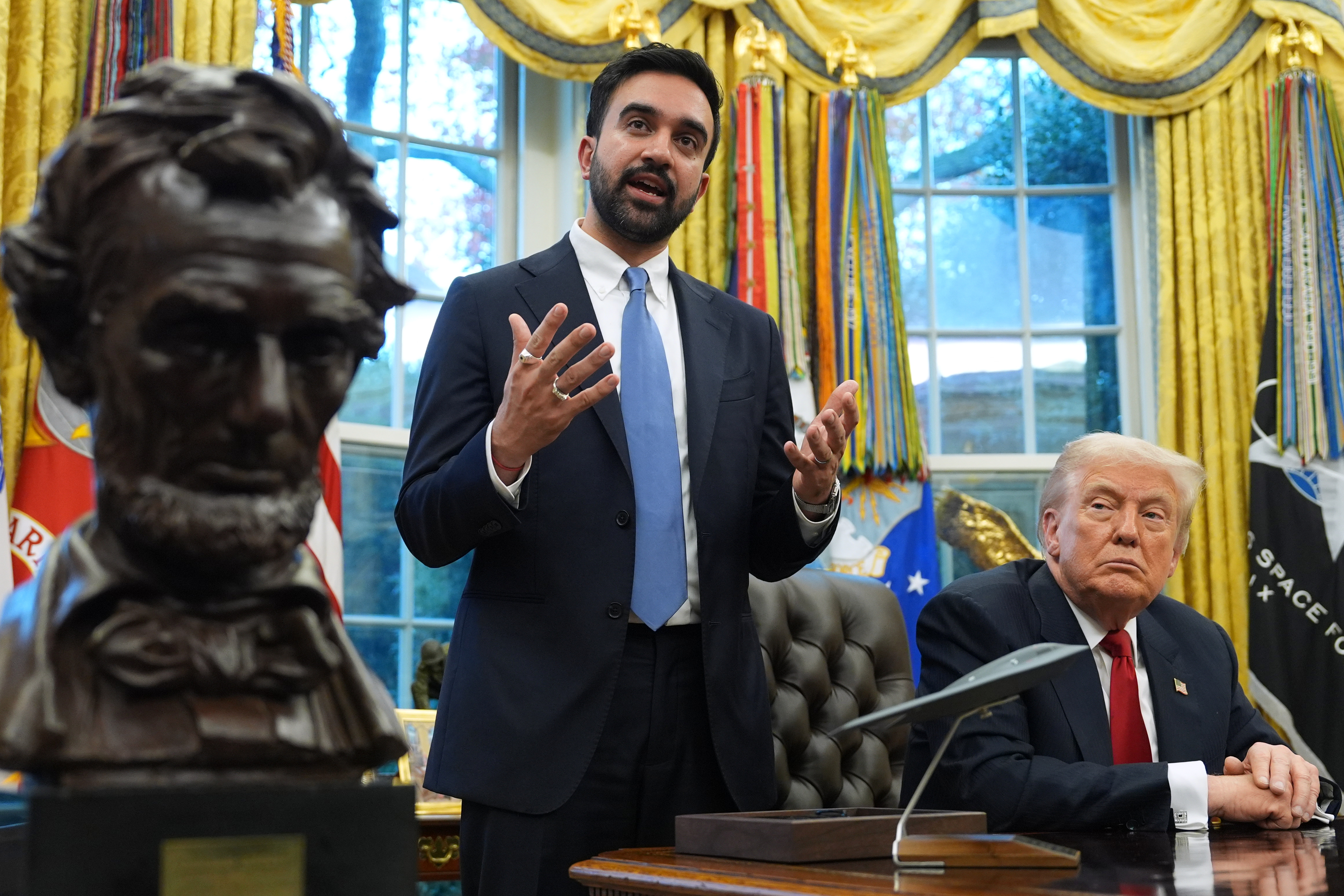 Zohran Mamdani speaks behind the Oval Office desk with Trump