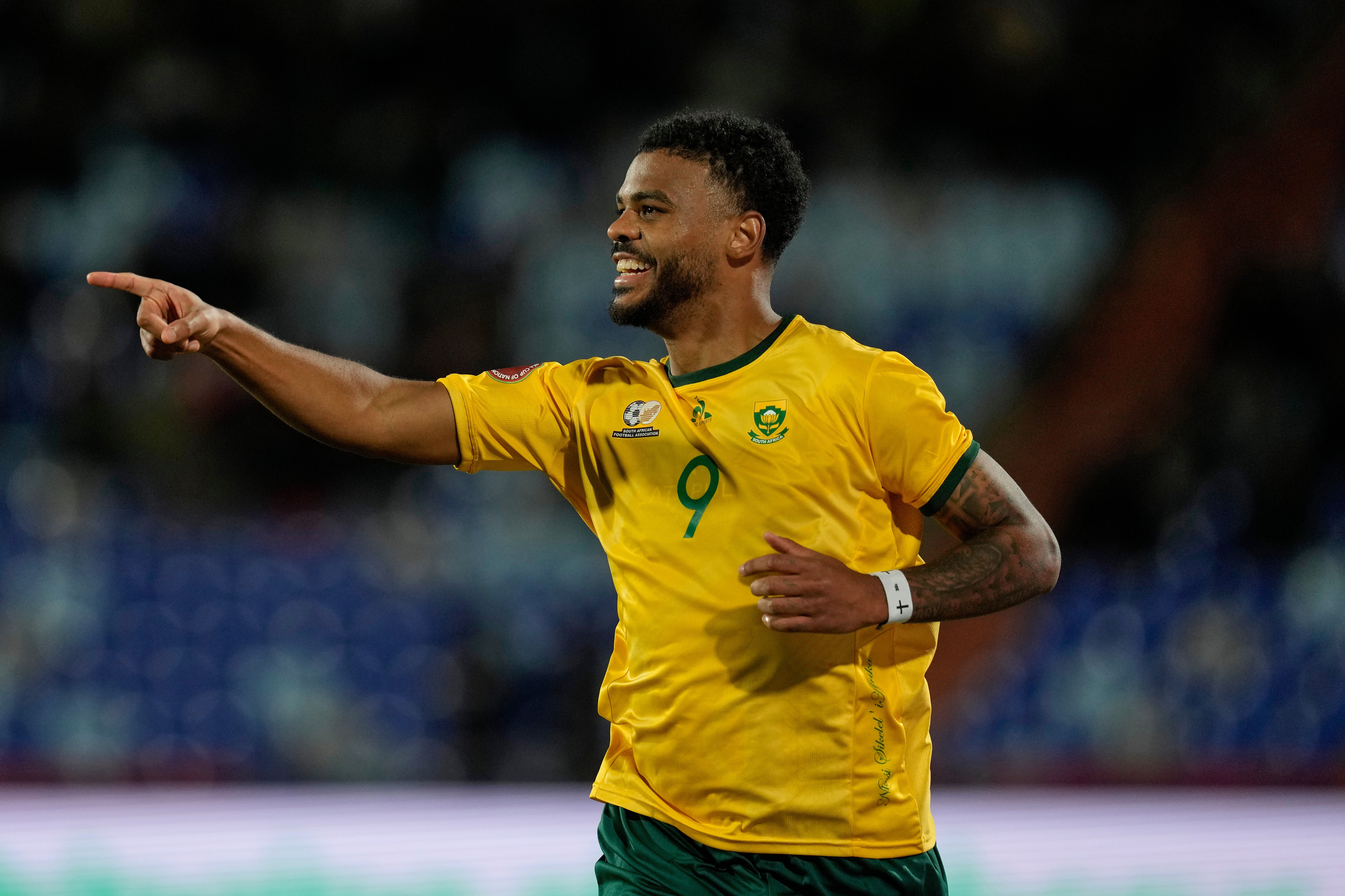 South Africa's Lyle Foster celebrates after scoring a goal during the Africa Cup of Nations group B soccer match between Angola and South Africa