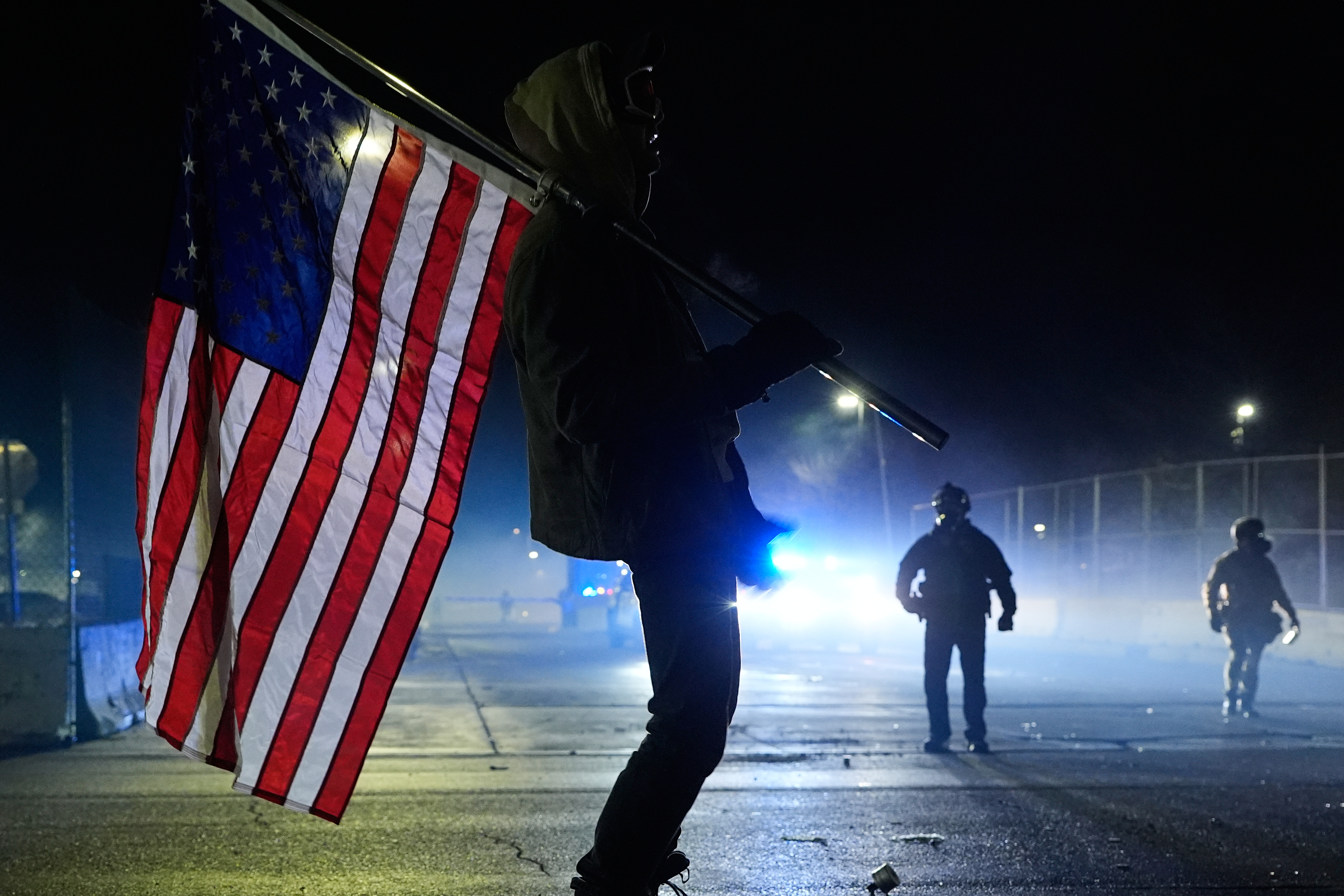 Tensions flare in Minnesota as protesters and federal agents square off