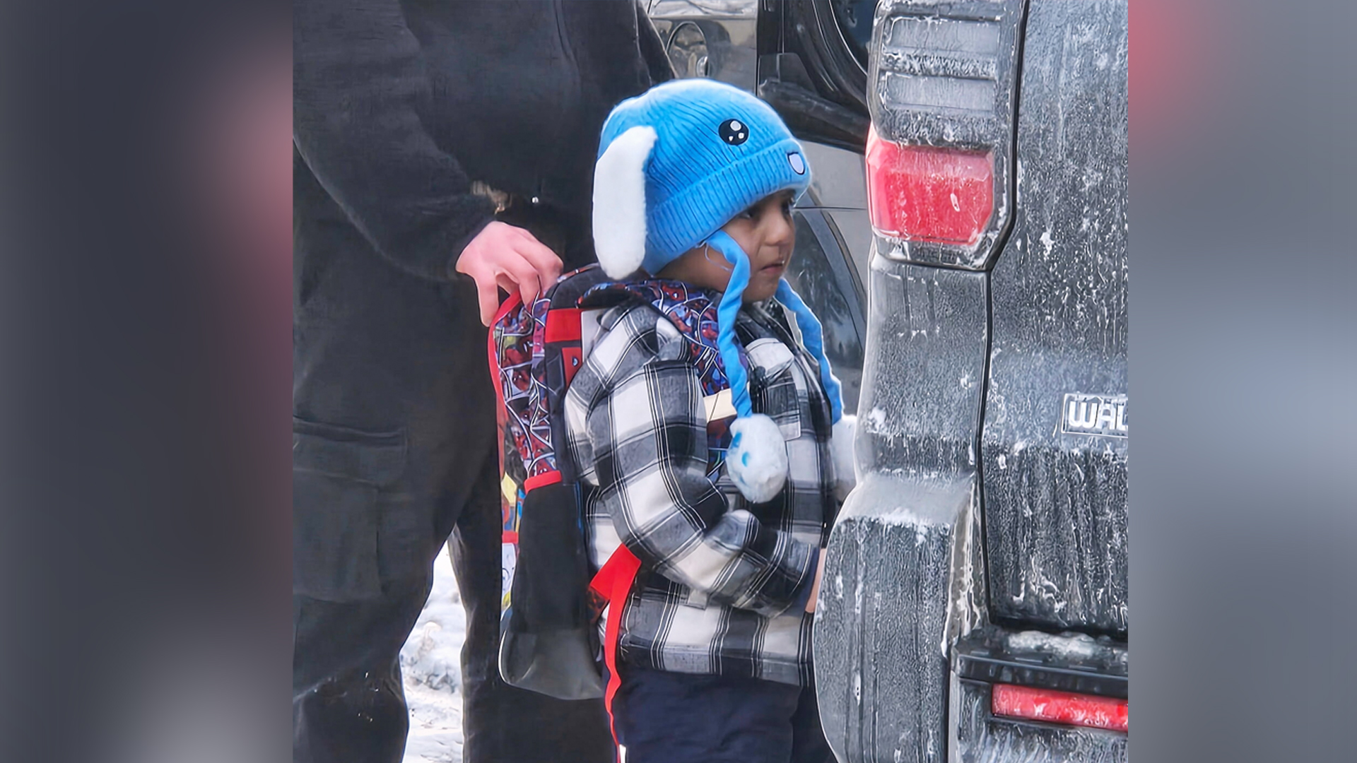 Liam Conejo Ramos, 5, is detained by U.S. Immigration and Customs Enforcement officers after arriving home from preschool, Tuesday, Jan. 20, 2026, in a Minneapolis suburb. [Ali Daniels via AP]