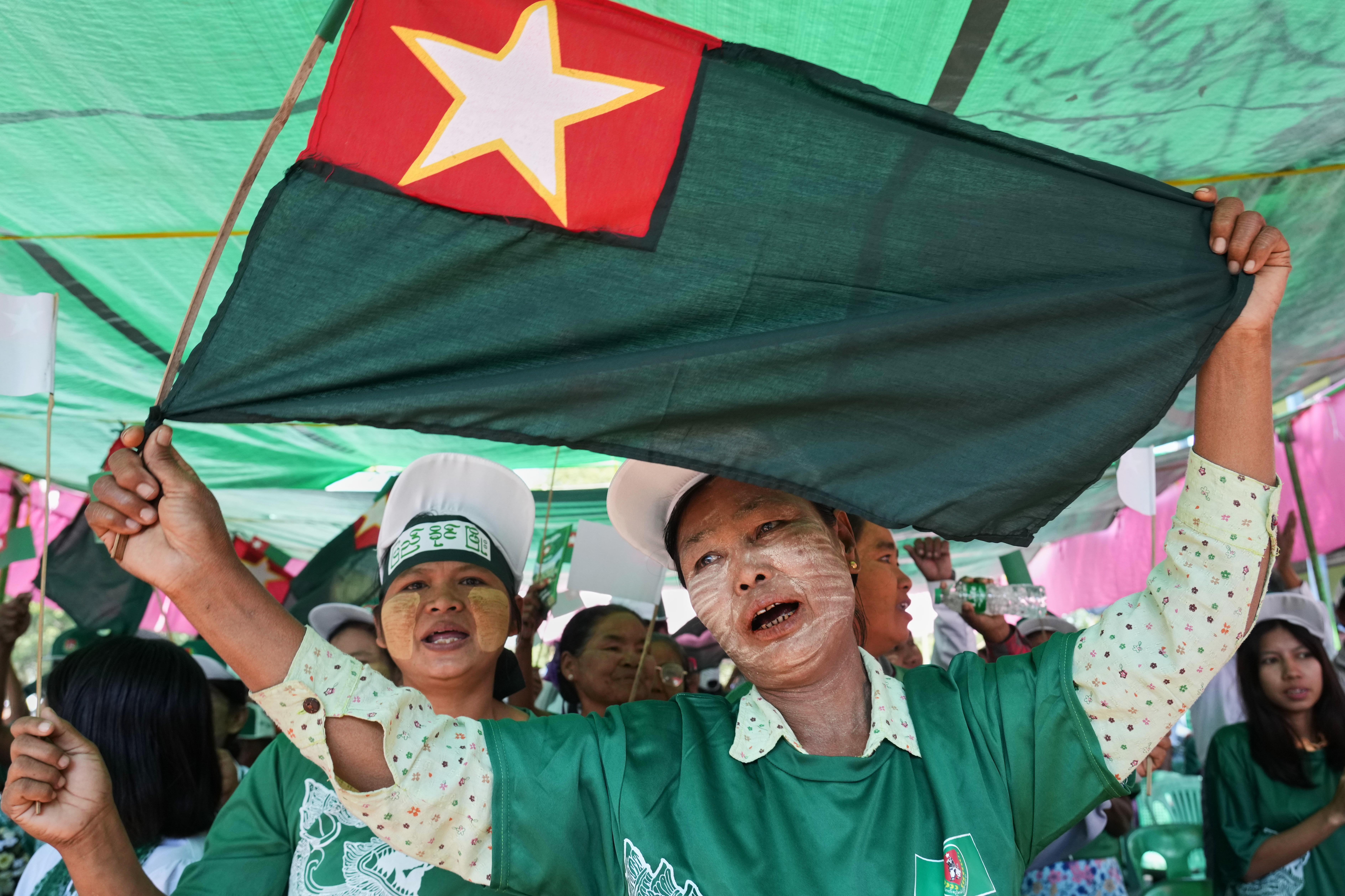 FILE - Supporters of the military-backed Union Solidarity and Development Party (USDP) dance during an election campaign in Wundwin Township, Mandalay Division, central Myanmar, Wednesday, Jan. 7, 2026. (AP Photo/Aung Shine Oo, File)