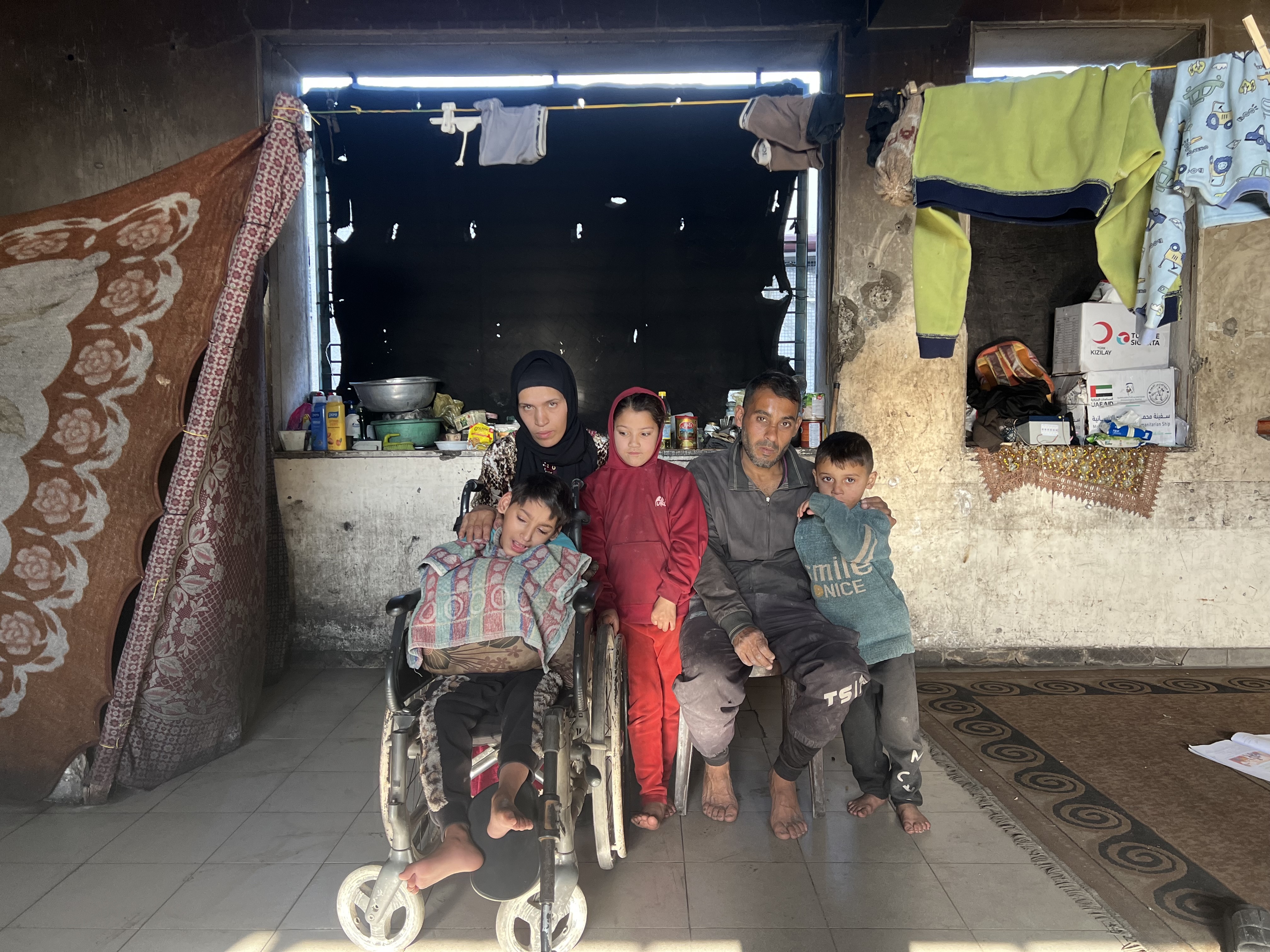 Jarad family from Jabalia displaced in a classroom in a school in Gaza City [Ola Al-Asi/Al Jazeera] 