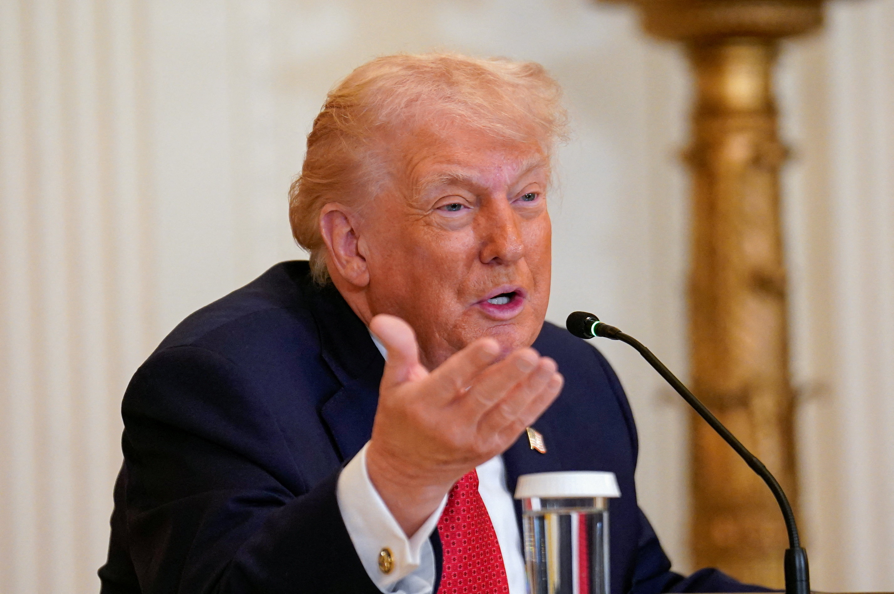 U.S. President Donald Trump participates in a roundtable on rural health, at the White House in Washington, D.C., U.S., January 16, 2026. REUTERS/Nathan Howard
