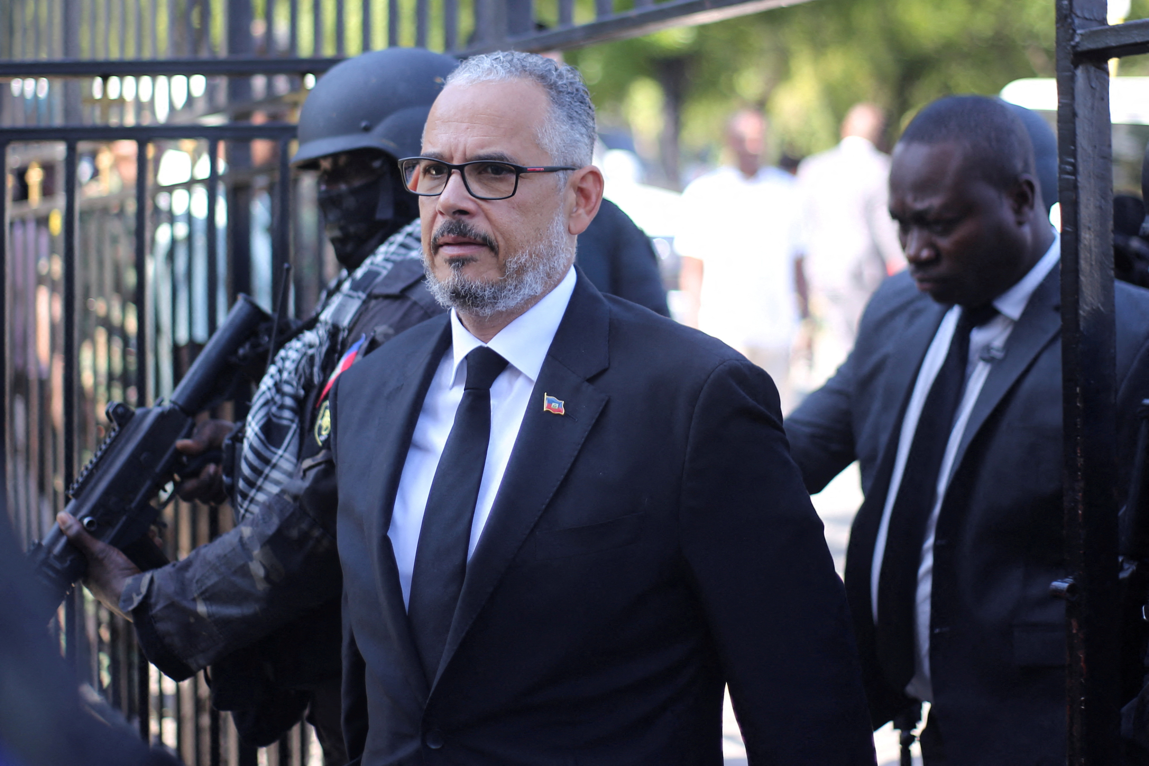 FILE PHOTO: Haiti's Prime Minister Alix Didier Fils-Aime walks as he attends a Mass in honor of Pope Francis at Saint Pierre church in Petionville, Port-au-Prince, Haiti April 25, 2025. REUTERS/Jean Feguens Regala/File Photo