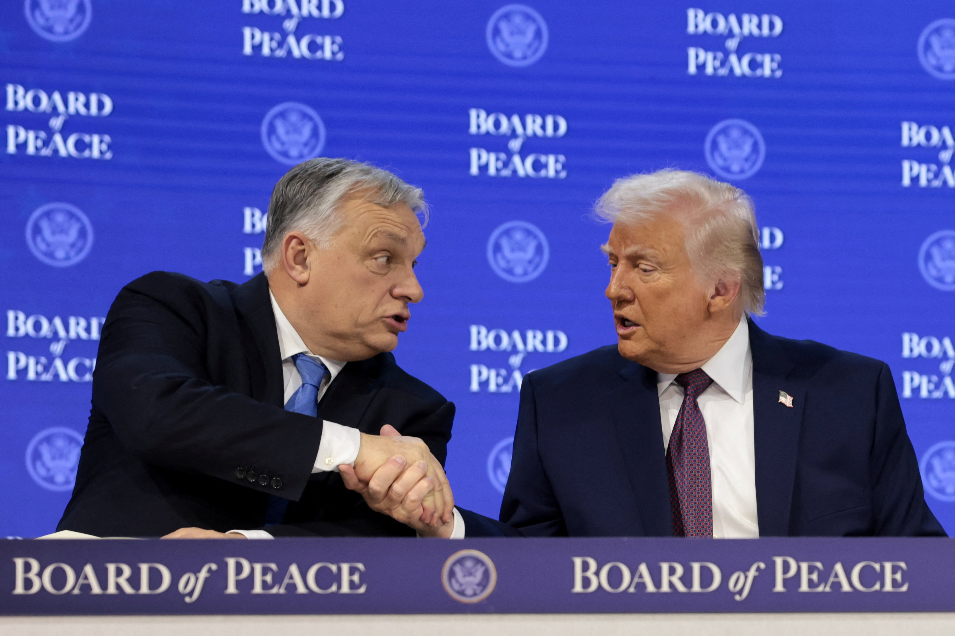 Viktor Orban and Donald Trump shake hands at Davos