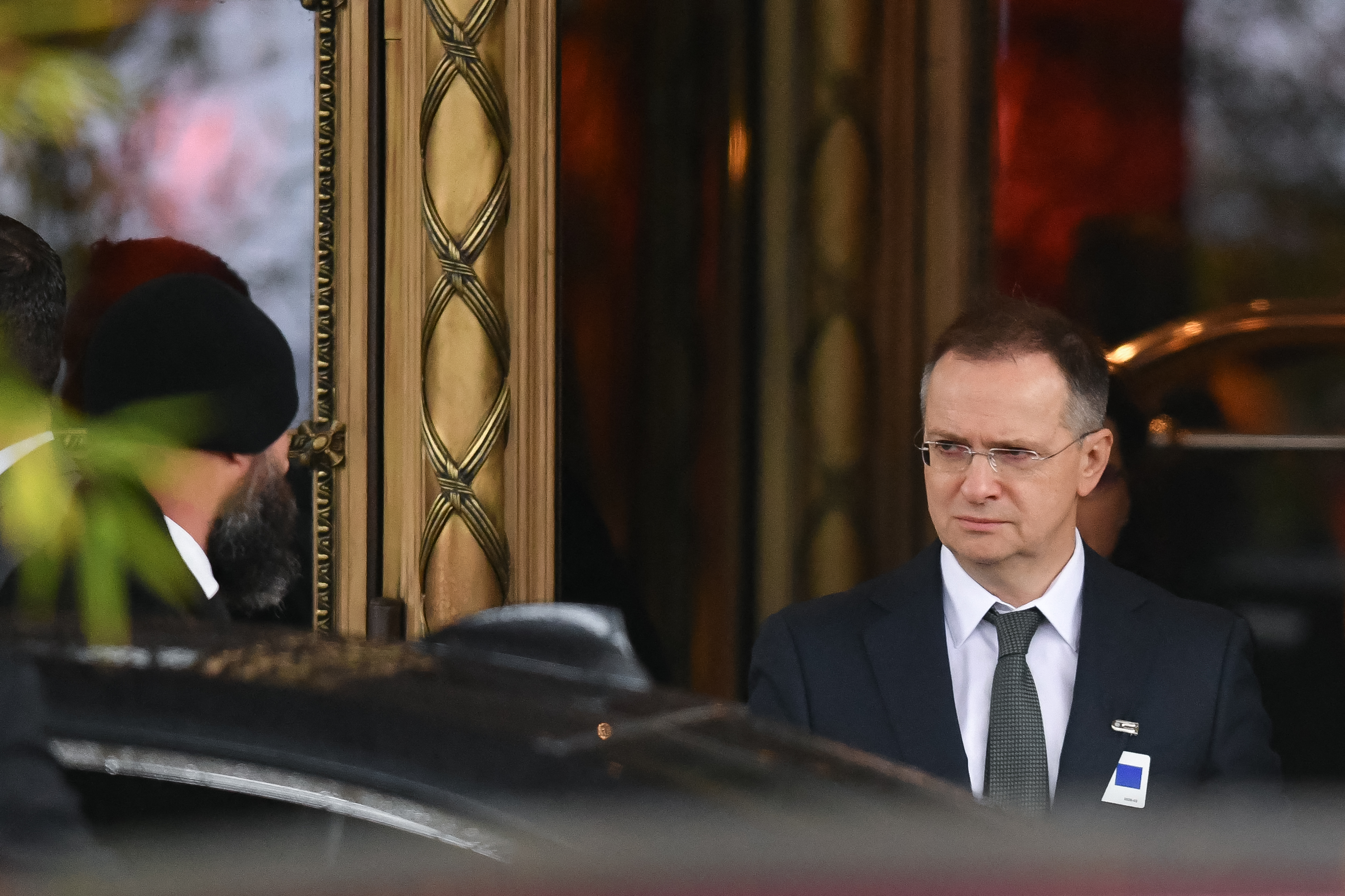 Russia's chief negotiator Vladimir Medinsky leaves after a two hours second round of US-mediated negotiation between Russia and Ukraine seeking to find an end to the four-year war, in Geneva on February 18, 2026