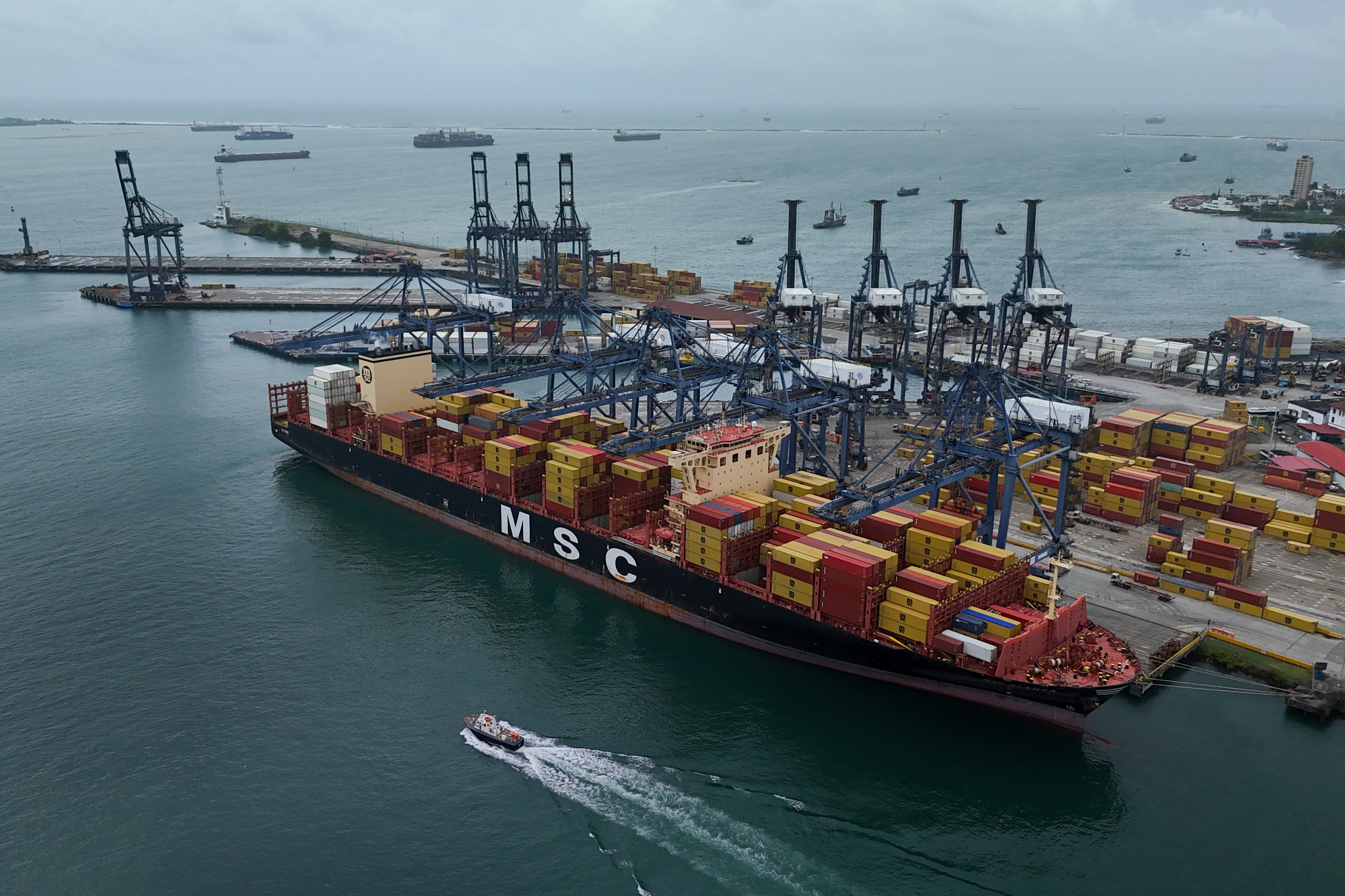 Cranes load and unload containers from cargo ships at the Cristobal port, previously operated by the Panama Ports Company, in Colon, Panama