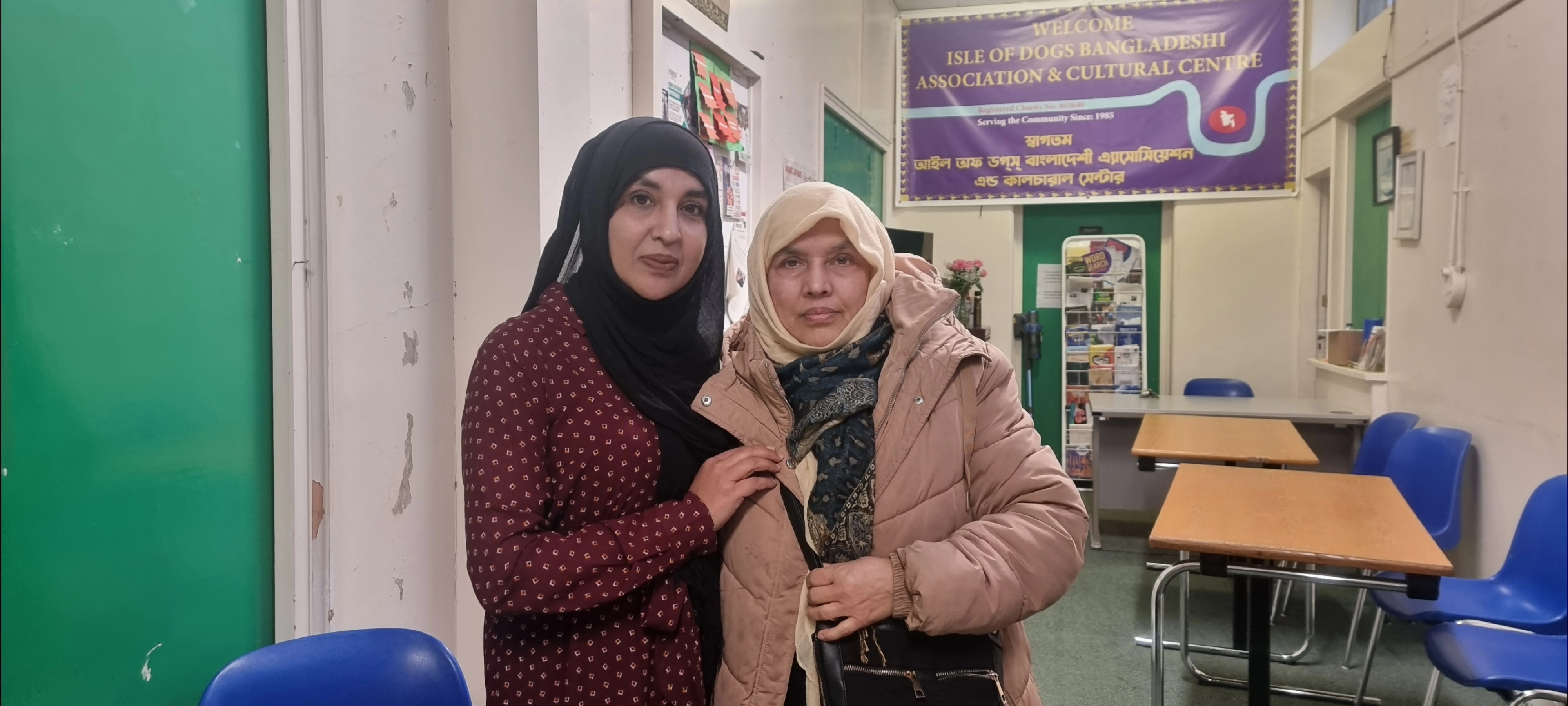Romina Khatun (R) with her daughter Nargis Akhtar. Unlike her mother, Akhtar isn't enthused about the elections [Indlieb Farazi Saber/Al Jazeera]
