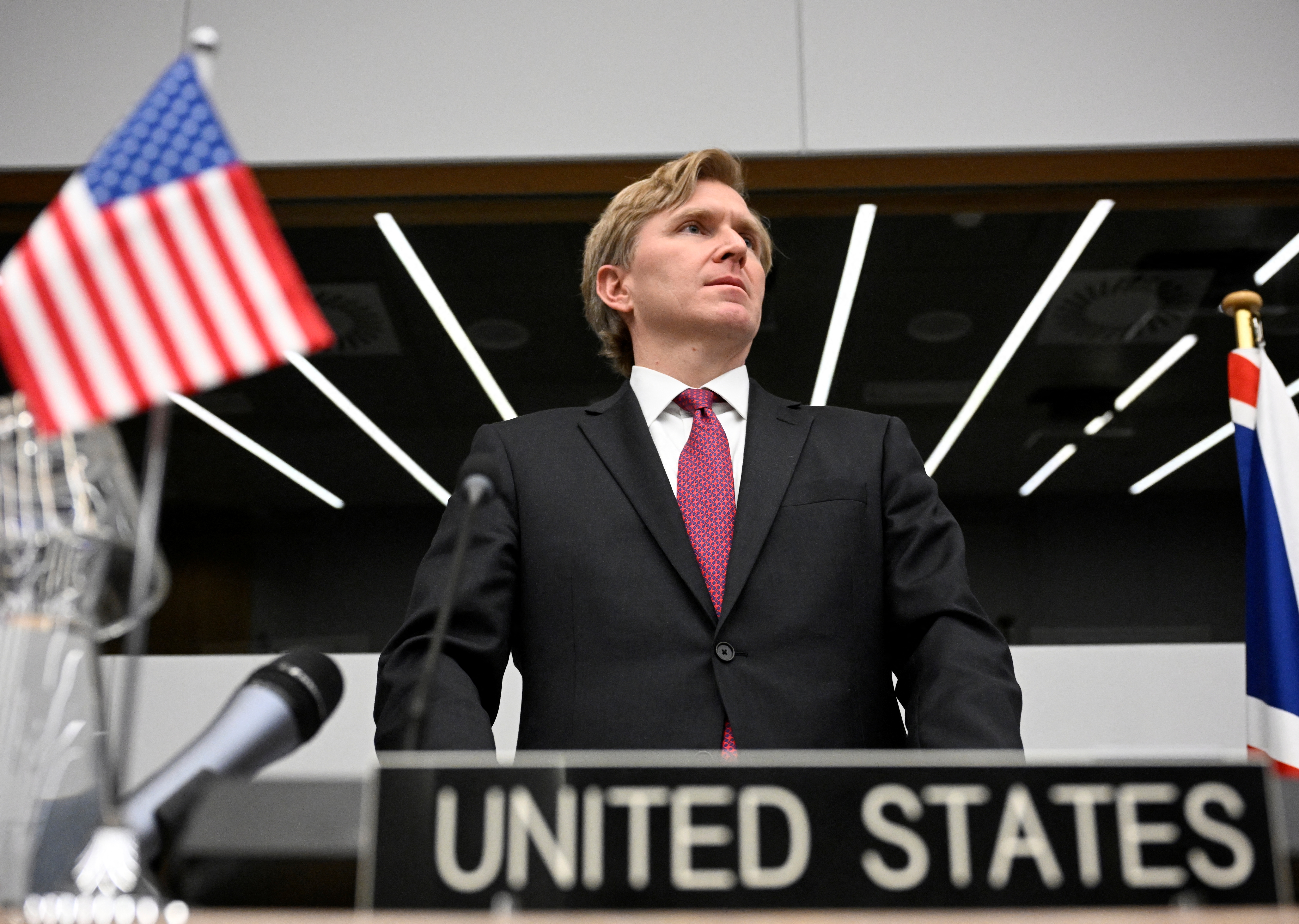 US' Under Secretary of War for Policy Elbridge Colby looks on as he arrives with others to address the media during a defence ministers meeting of The North Atlantic Treaty Organisation (NATO) at NATO Headquarters in Brussels on February 12, 2026.