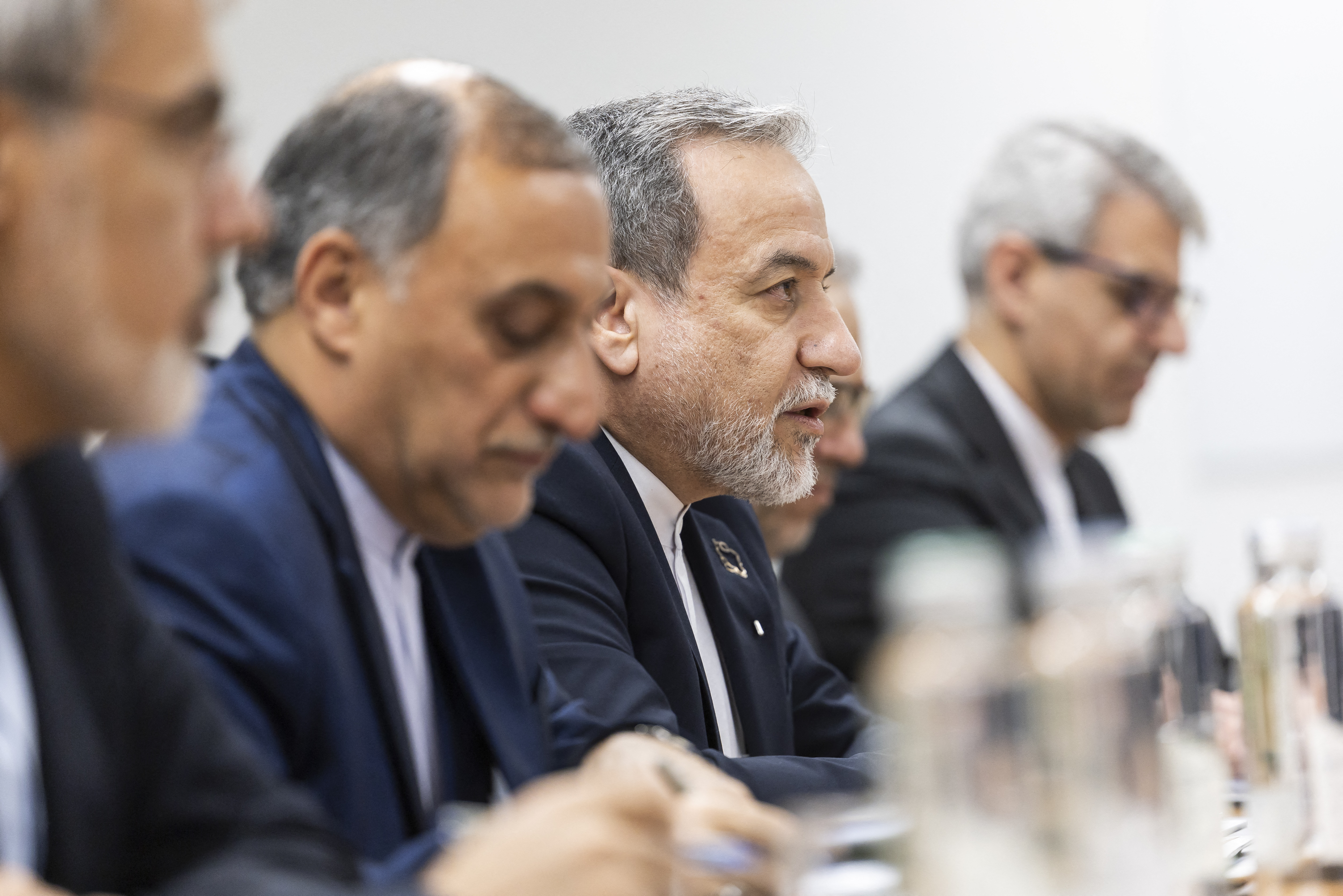 Iran's Foreign Minister Abbas Araghchi speaks during a bilateral meeting between Switzerland and Iran during a second round of US-Iranian talks with Washington pushing Tehran to make a deal to limit its nuclear programme, in Geneva on February 17, 2026. (Photo by CYRIL ZINGARO / POOL / AFP)