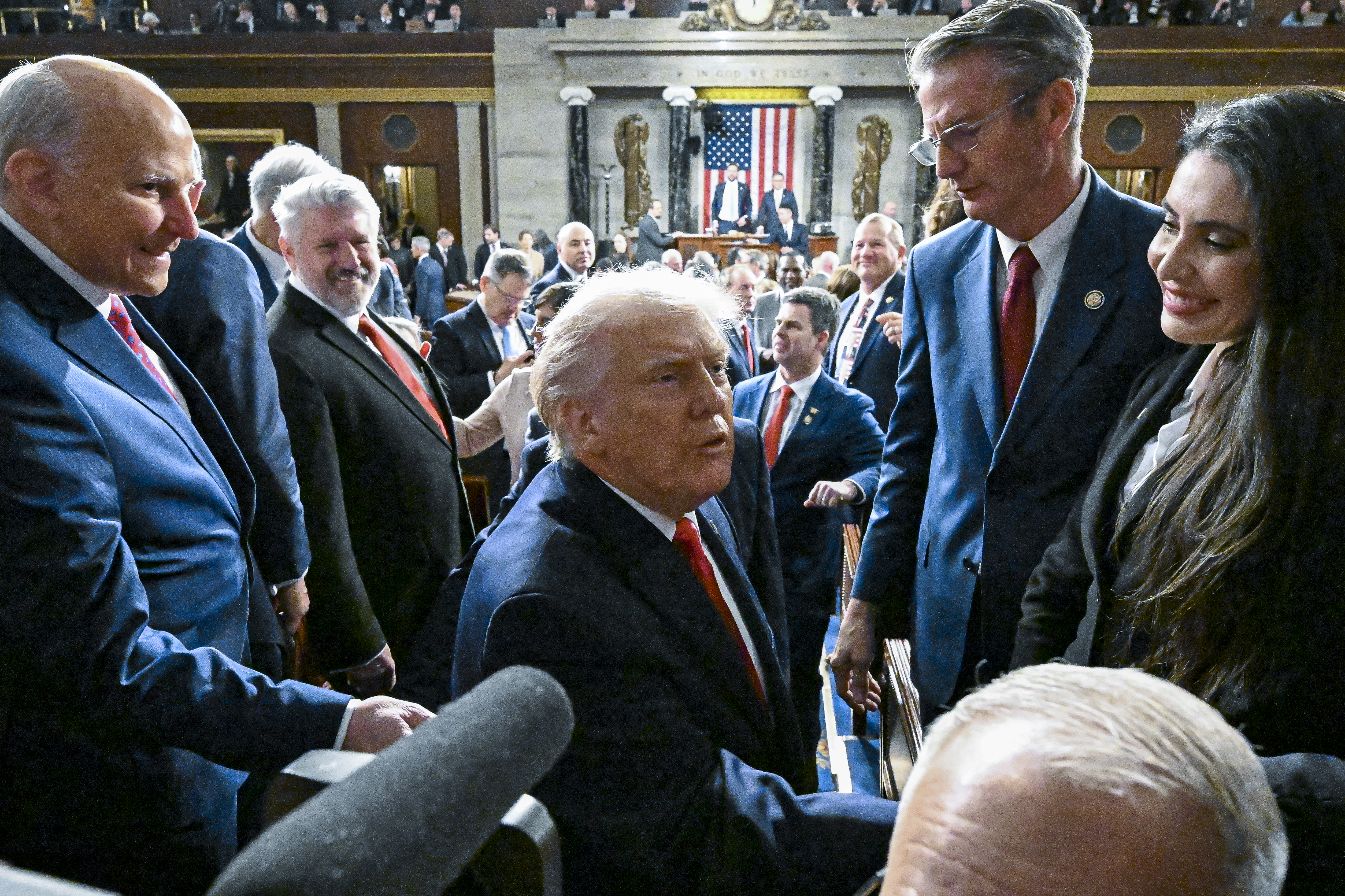 US President Donald Trump exits the House Chamber after delivering the first State of the Union address of his second term to a joint session of Congress in the House Chamber of the United States Capitol in Washington, DC, on February 24, 2026. (Photo by Kenny Holston/The New York Times / POOL / AFP)