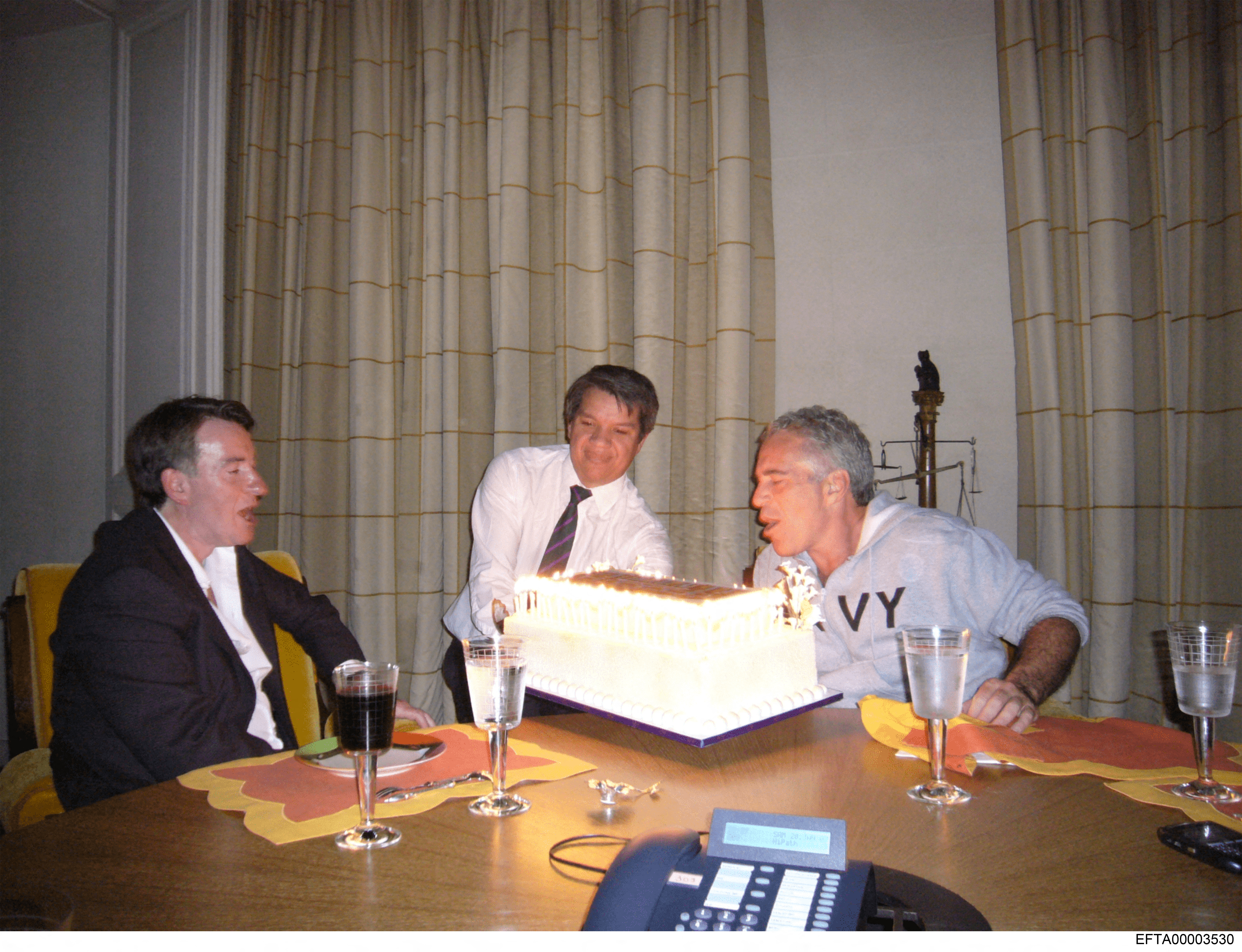 This undated photo in an unidentified location provided by the US Justice Department on December 19, 2025 shows former UK Ambassador in the US Peter Mandelson (L) and Jeffrey Epstein (R), a wealthy US financier who died in jail in 2019 while awaiting trial for sex trafficking underage girls.