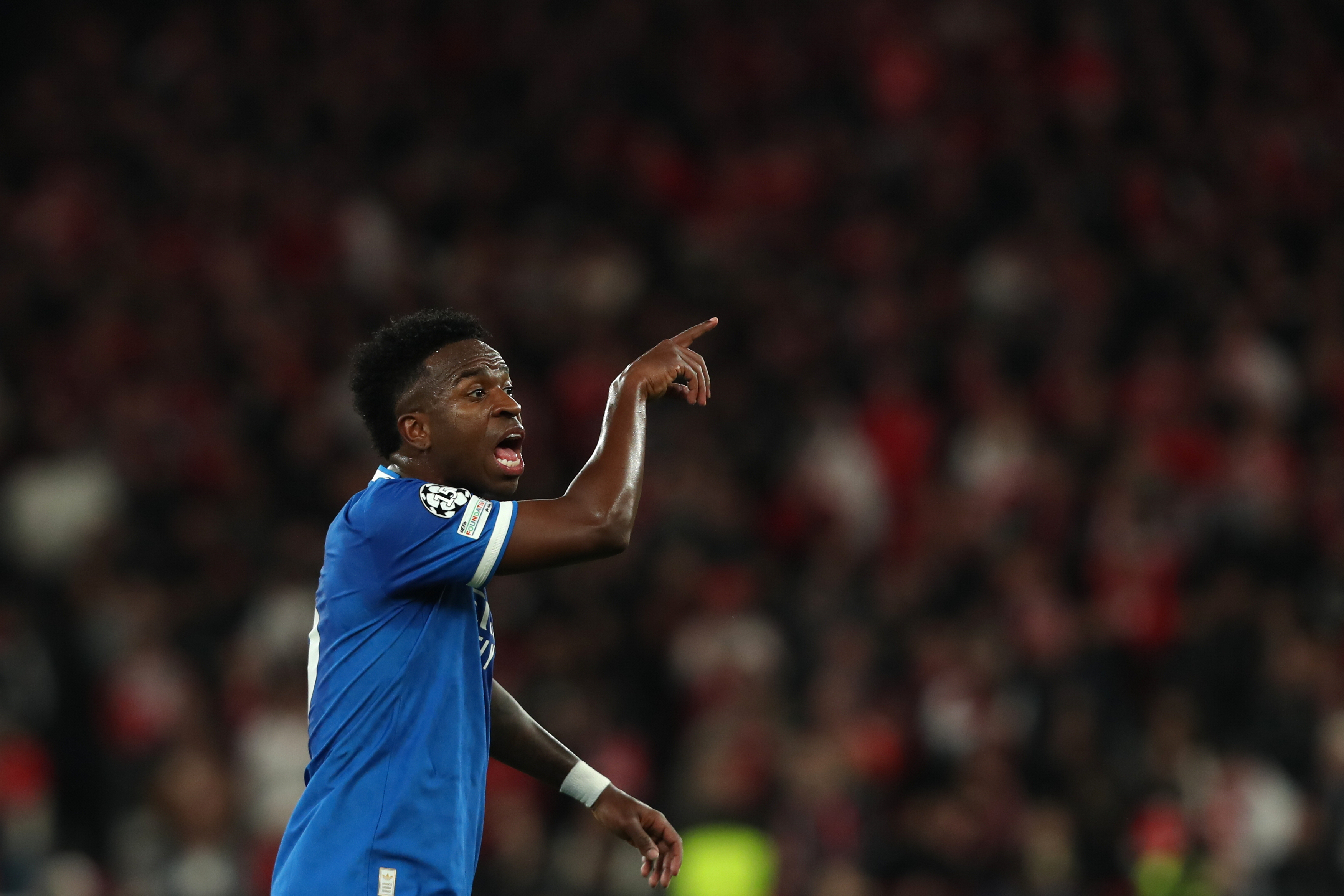 Real Madrid's Vinicius Junior argues after scoring the opening goal during a Champions League playoff soccer match between SL Benfica and Real Madrid in Lisbon, Portugal, Tuesday, Feb. 17, 2026. (AP Photo/Pedro Rocha)