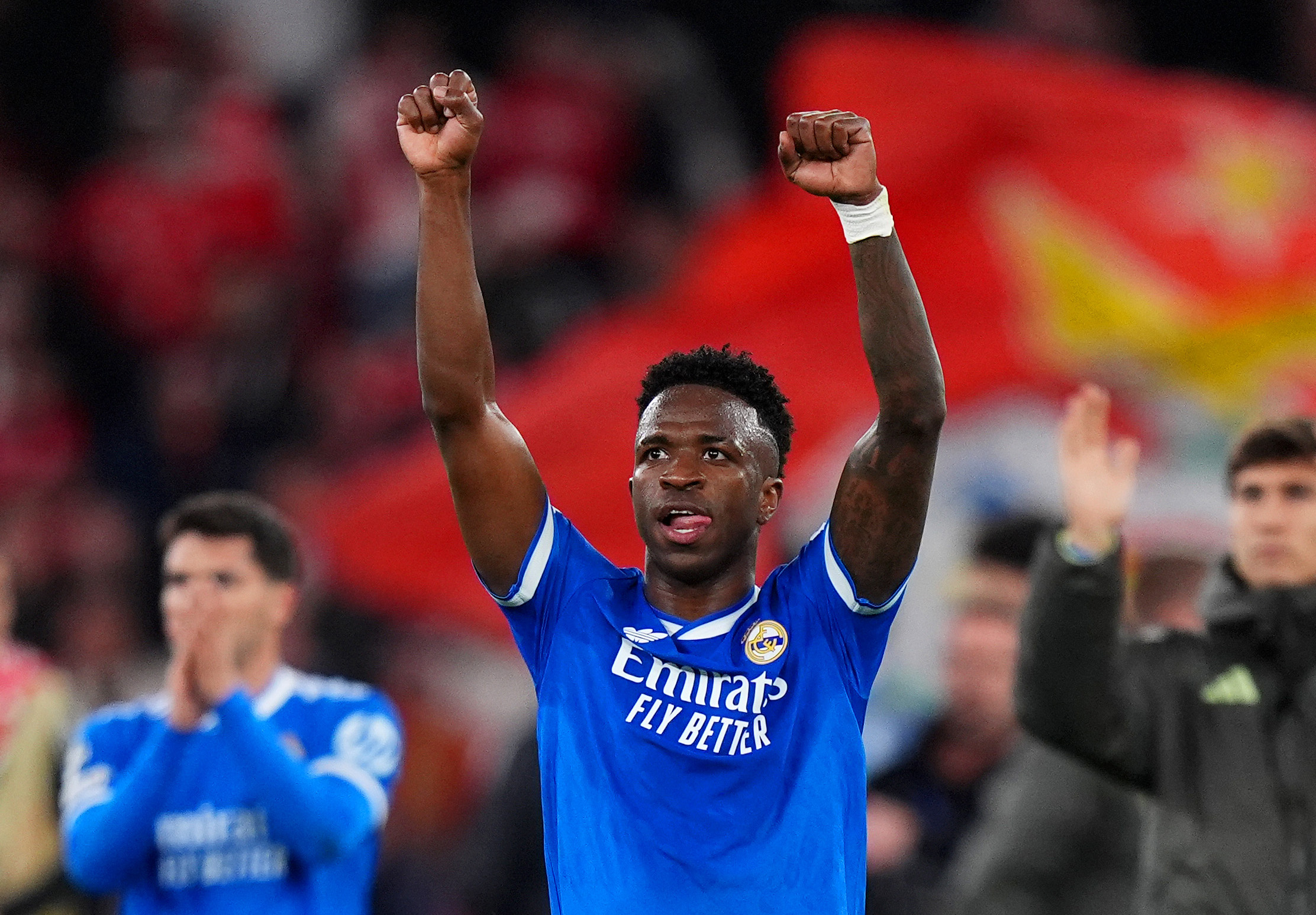 LISBON, PORTUGAL - FEBRUARY 17: Vinicius Junior of Real Madrid celebrates after the team's victory during the UEFA Champions League 2025/26 League Knockout Play-off First Leg match between SL Benfica and Real Madrid C.F. at Estadio do SL Benfica on February 17, 2026 in Lisbon, Portugal. (Photo by Angel Martinez/Getty Images)
