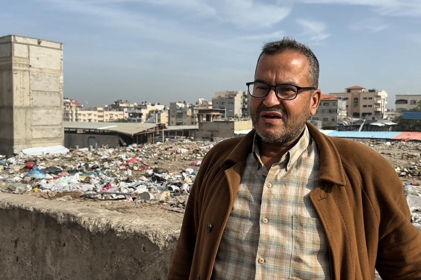Fayez al-Jadi, a Palestinian father displaced 12 times by the war, says rats run over his children's faces while they sleep in their tent atop a solid waste dump in Gaza City. [Screengrab/Al Jazeera]