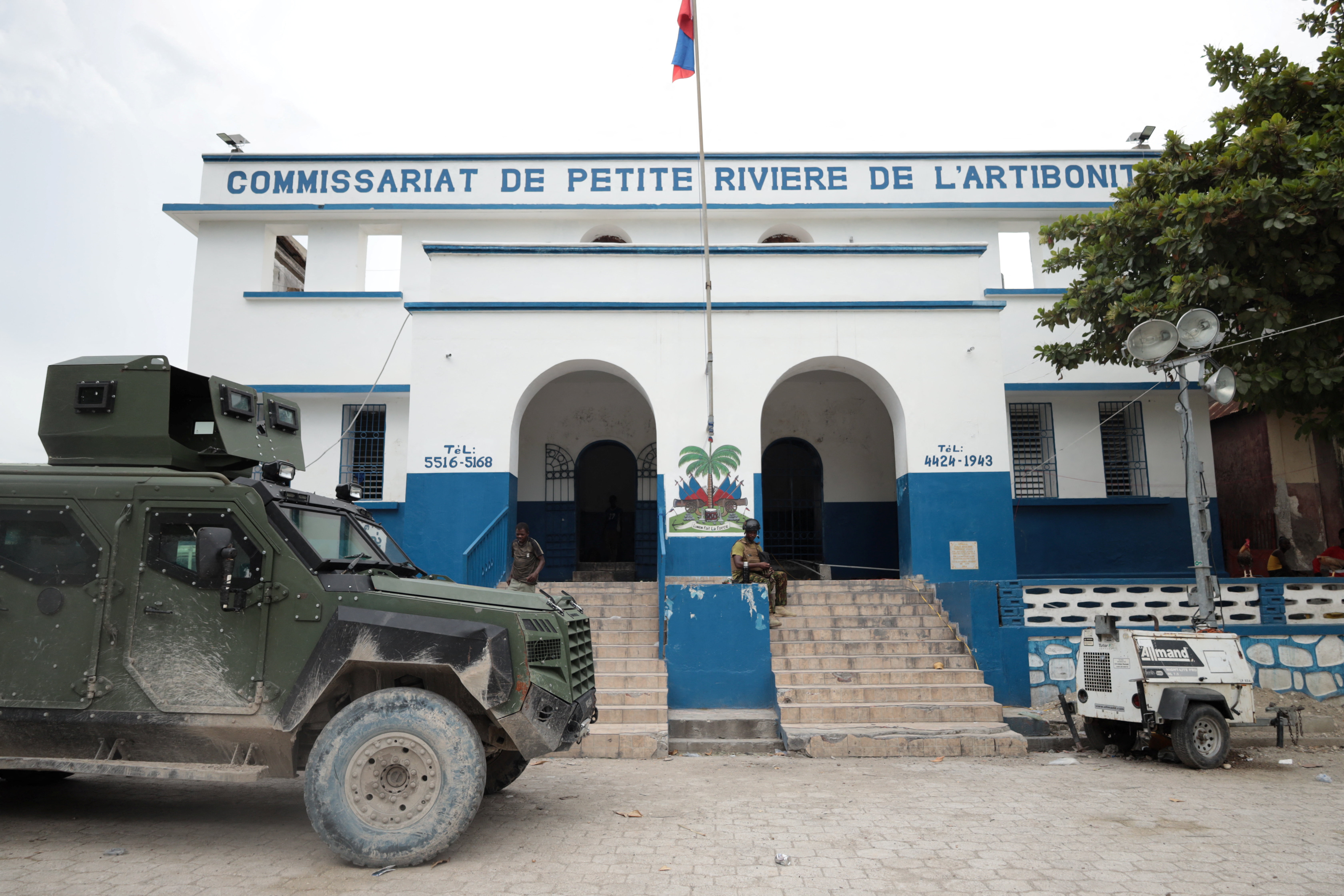 A police vehicle is parked in front of a police station in Artibonite in central Haiti