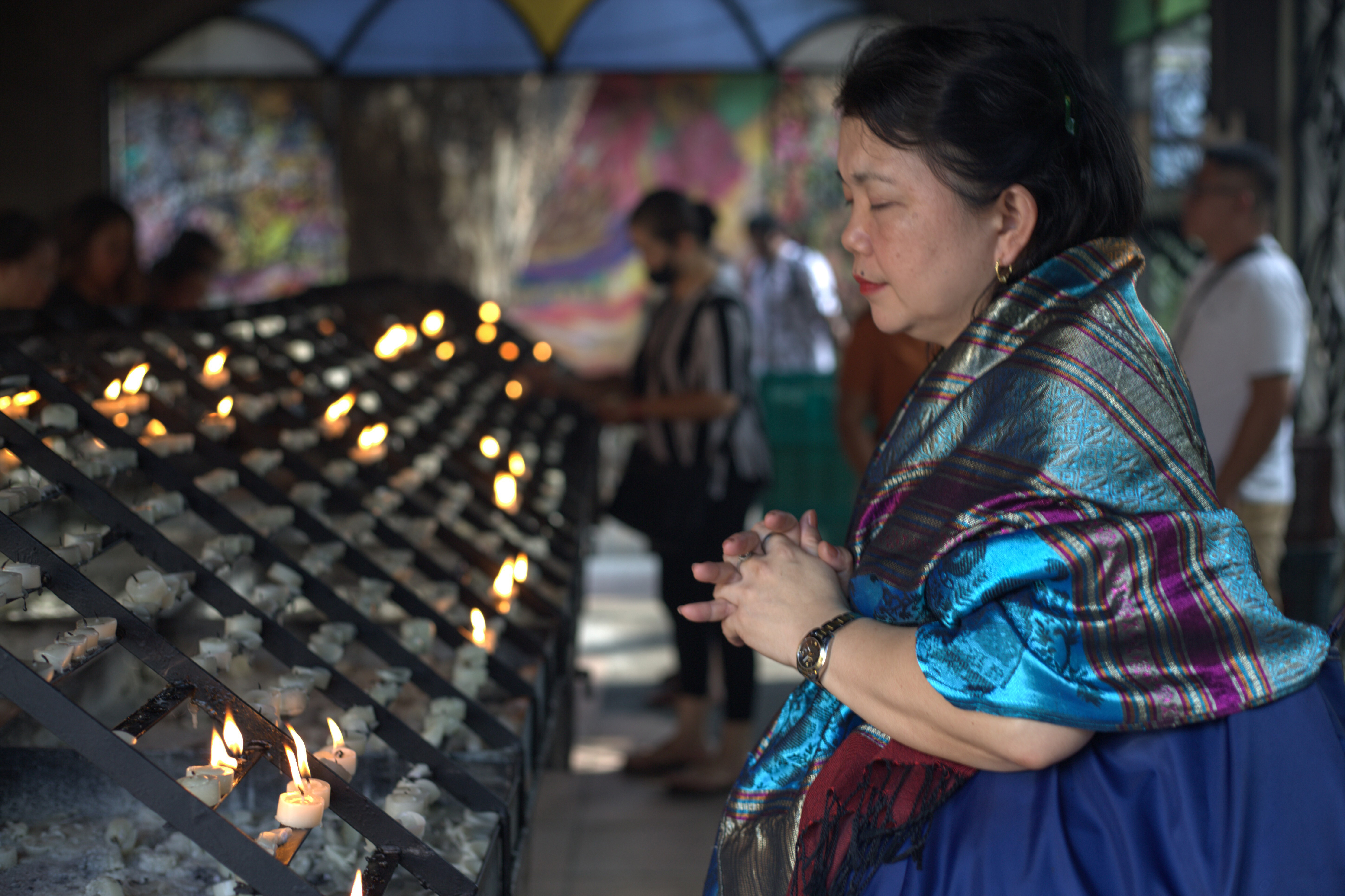 A Catholic devotee prays at Manila's Baclaran Church, which typically attracts thousands every Wednesday, but which was been left significantly quieter as the country faces a fuel price crunch.