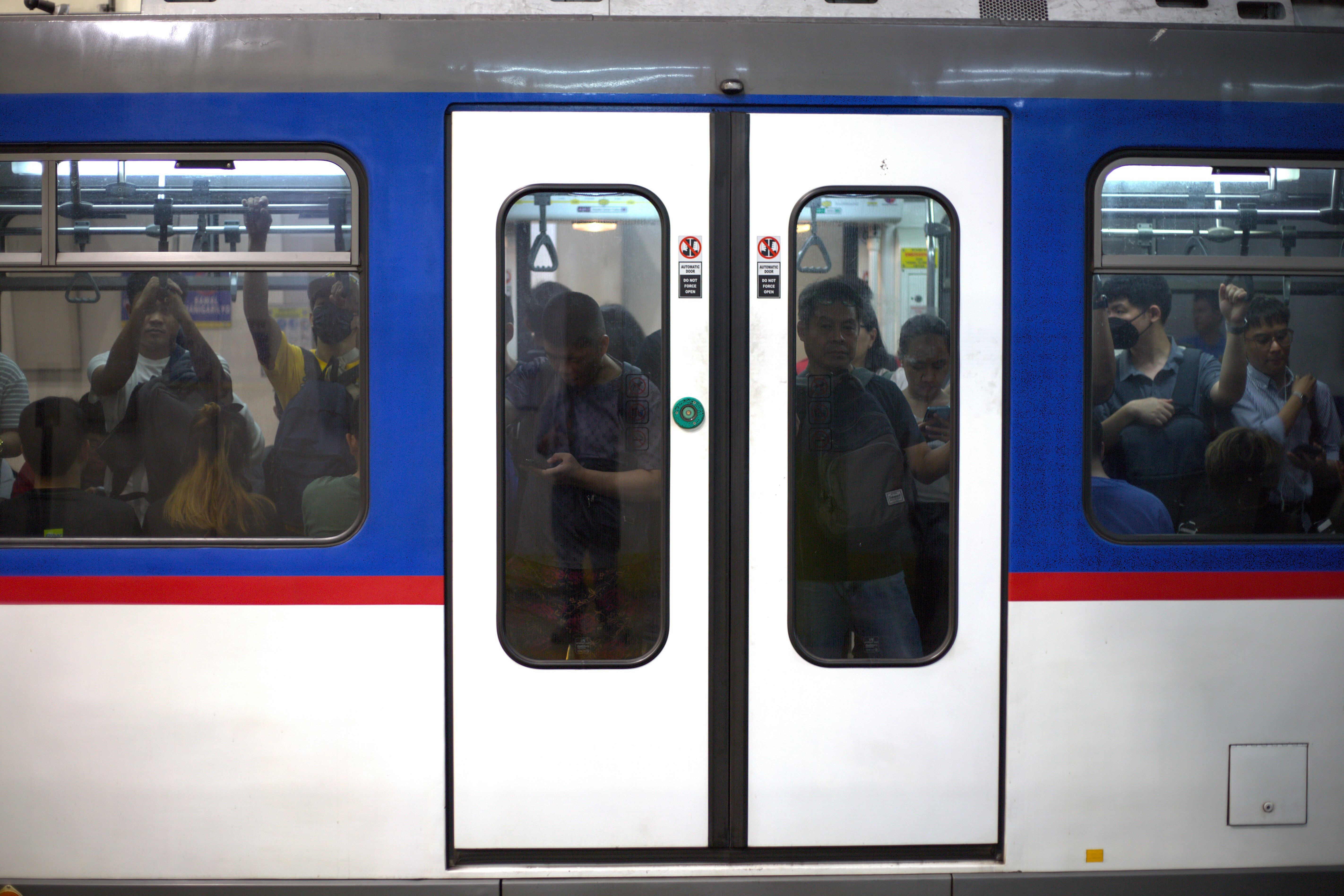 As fewer buses, jeepneys and ride-hailing vehicles ply the streets due to the fuel price hike, more commuters have been forced to use Manila's railway system, creating bottlenecks during rush hour while exposing the acute insufficiency of the train network.