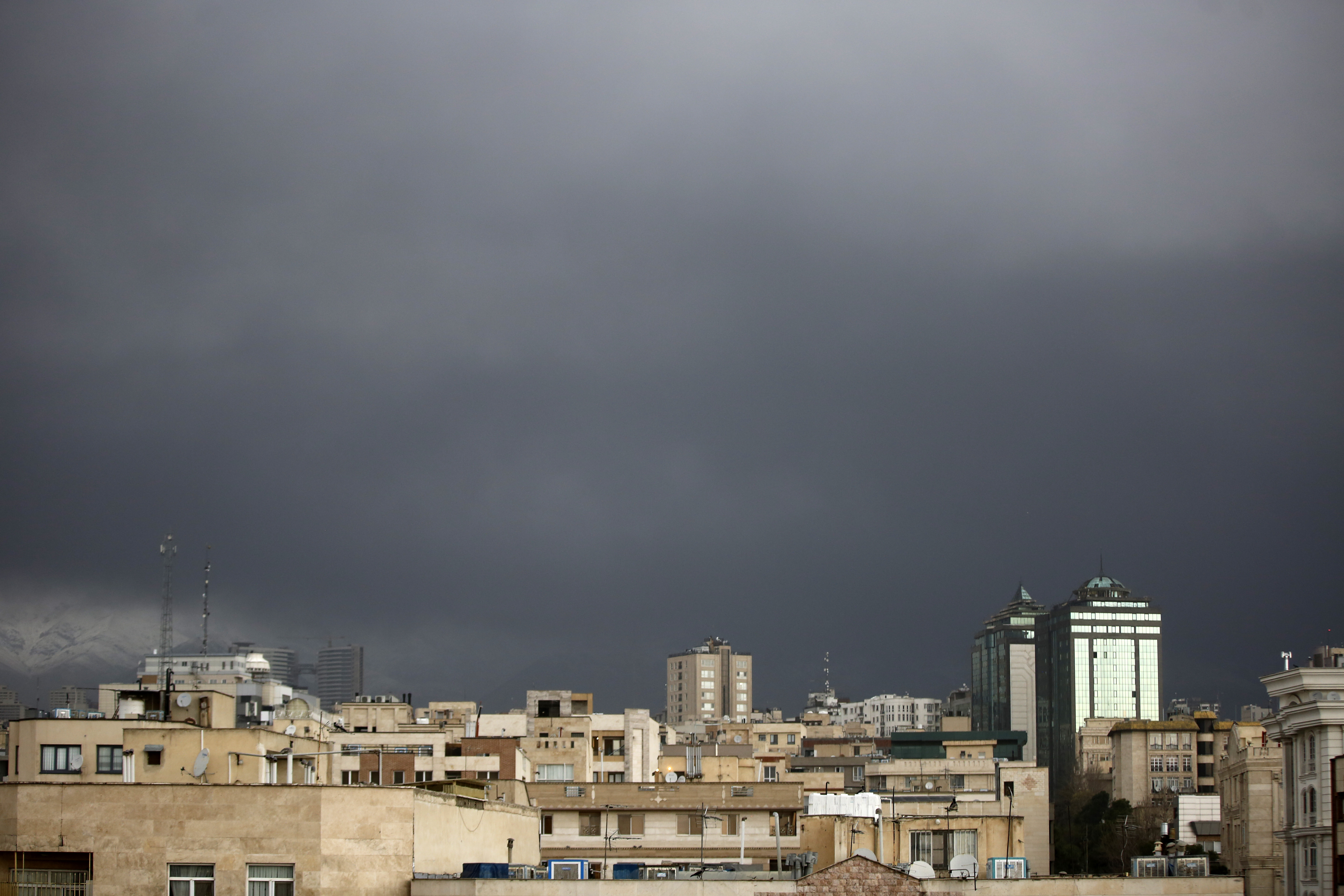 A dark haze hung over the city as Sunday morning broke and a smell of burning lingered in the air.