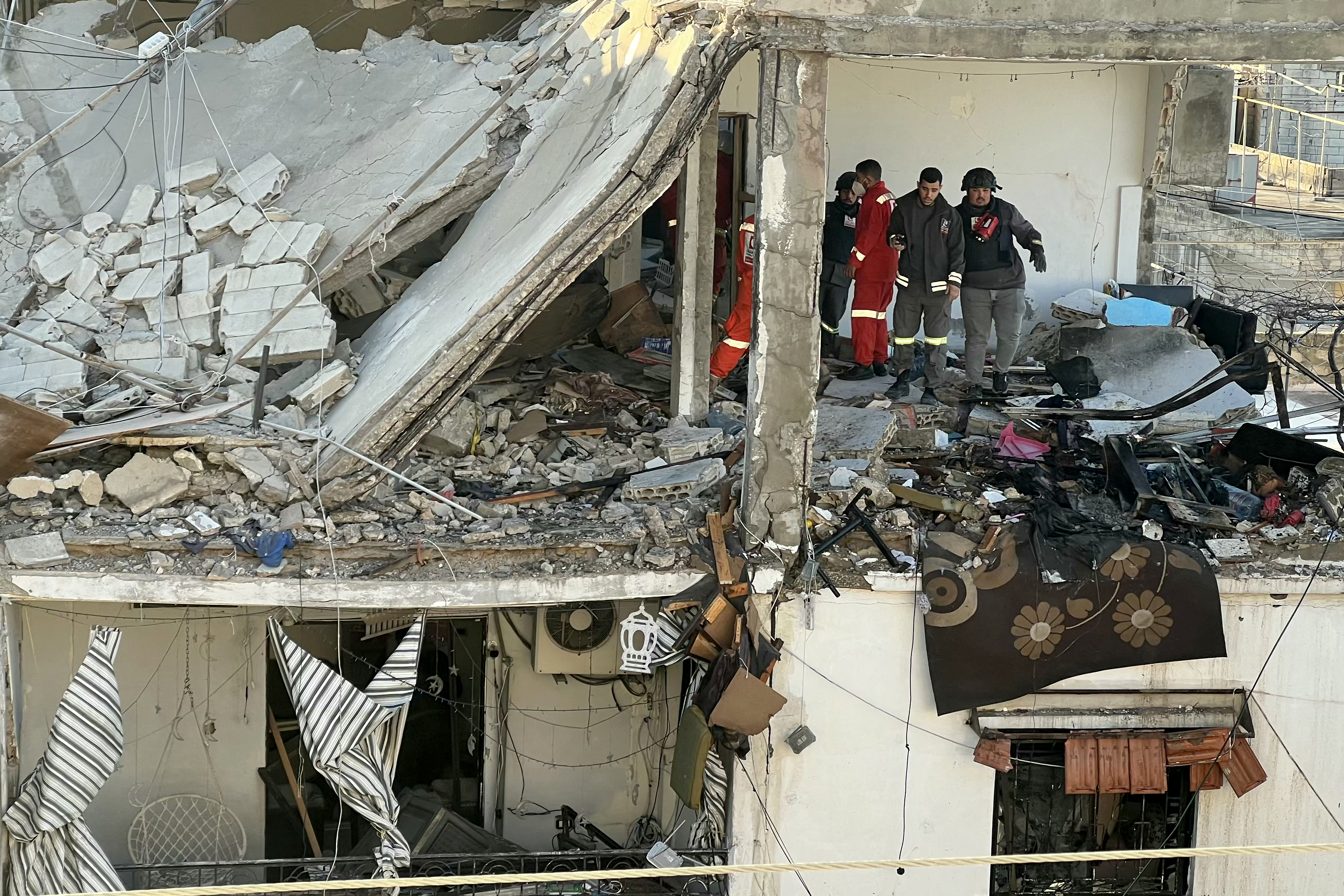 First aid responders are seen at the site of an Israeli airstrike