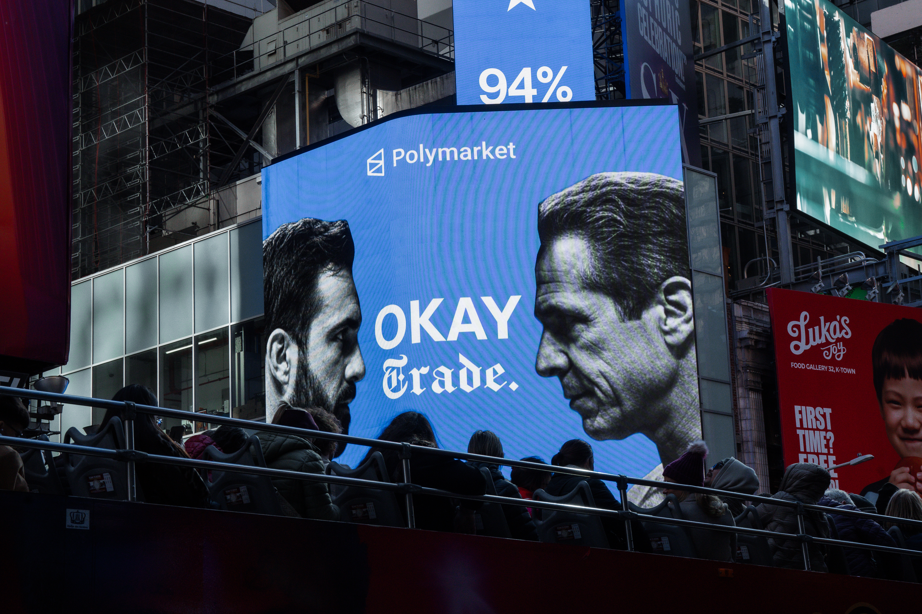 An advertisement by the American company Polymarket show Zohran Mamdani and Andrew Cuomo ahead of the New York City mayoral election on Tuesday, Nov. 4, 2025, in New York. (AP Photo/Olga Fedorova)