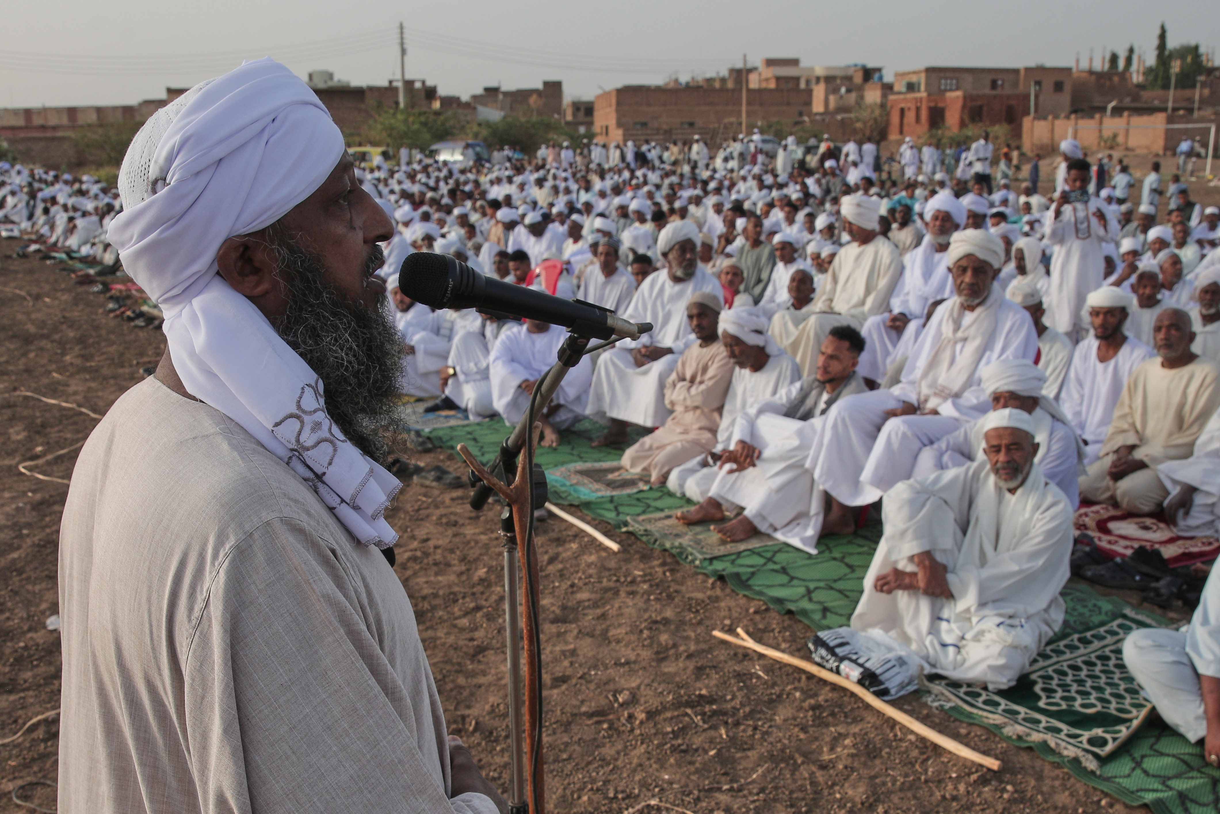 Sudanese gather for the Eid al-Fitr prayer, the Muslim holiday marking the end of Ramadan, Islam's holy month of fasting, in Khartoum, Sudan, Friday, March 20, 2026. (AP Photo/Marwan Ali)