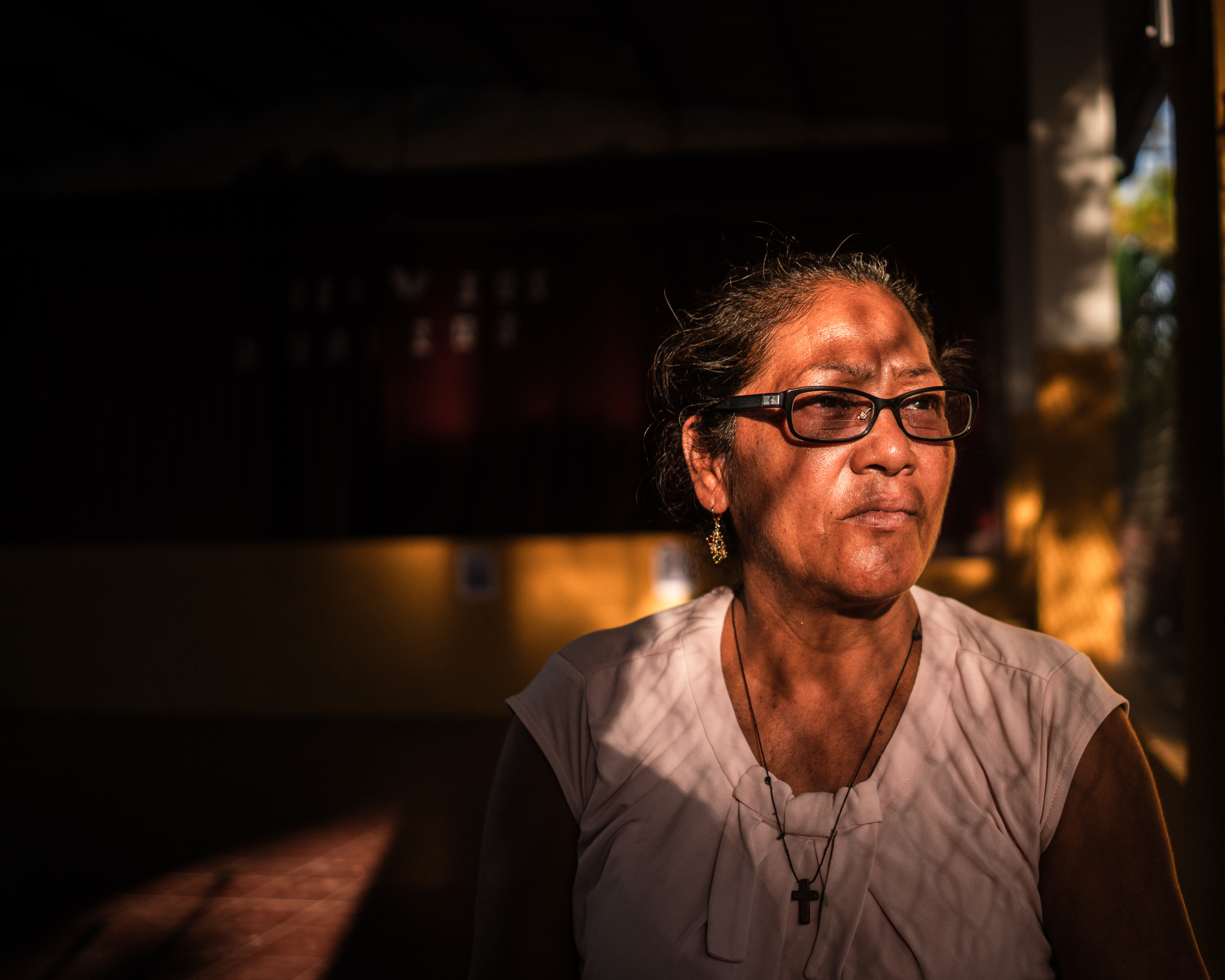 Sara de Perez, 54, one of the mothers of those imprisoned under the state of emergency, pictured in the courtyard of El Rosario’s church, El Salvador [Euan Wallace/ Al Jazeera]