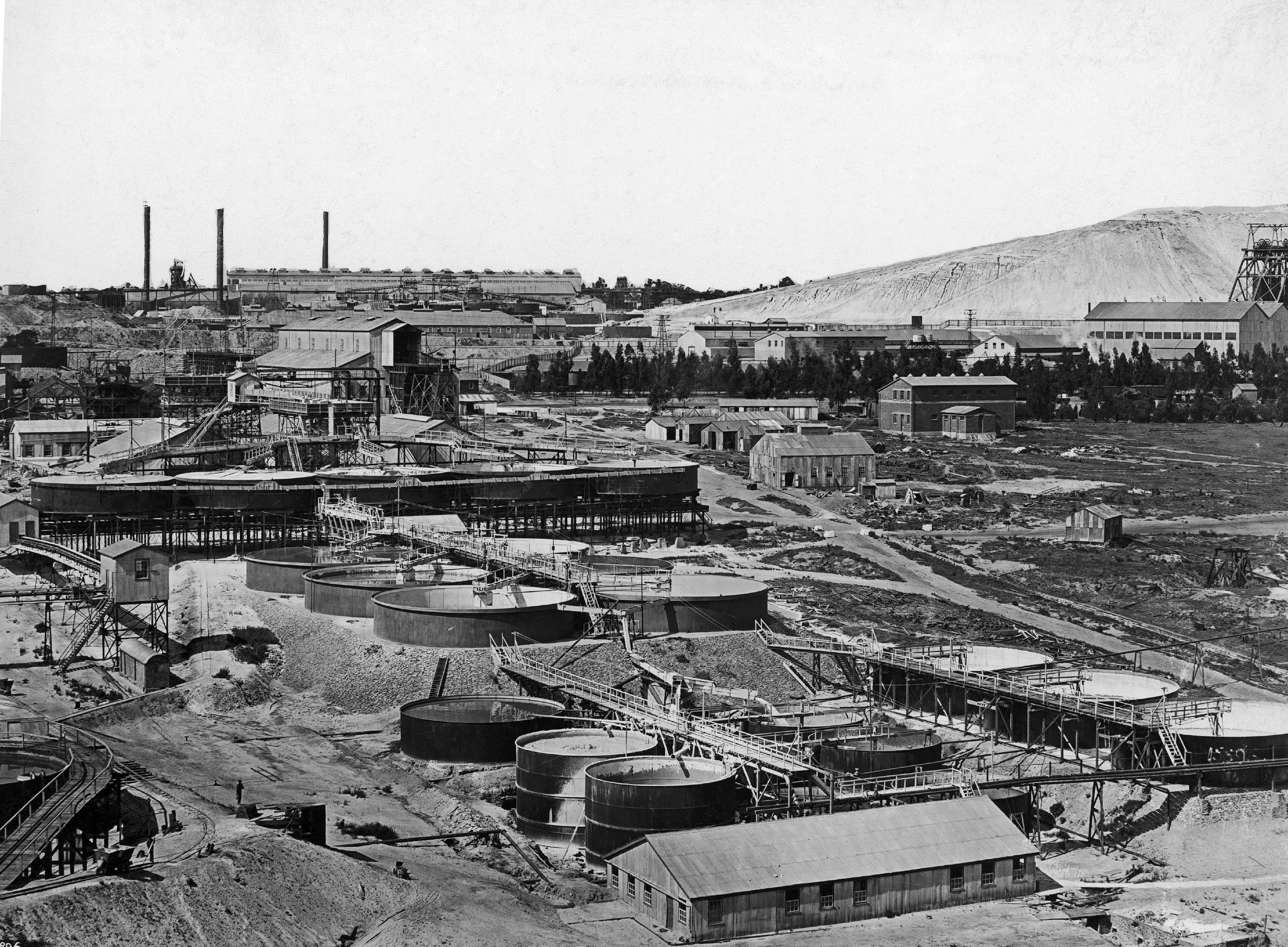SOUTH AFRICA - JUNE 22: Buildings Making Up A Gold Extraction Mine And In The Background On The Right, The Factories Which Treat And Transform The Precious Material, Near Johannesburg, South Africa, Between June 22 And 25, 1925. (Photo by Keystone-France/Gamma-Keystone via Getty Images)