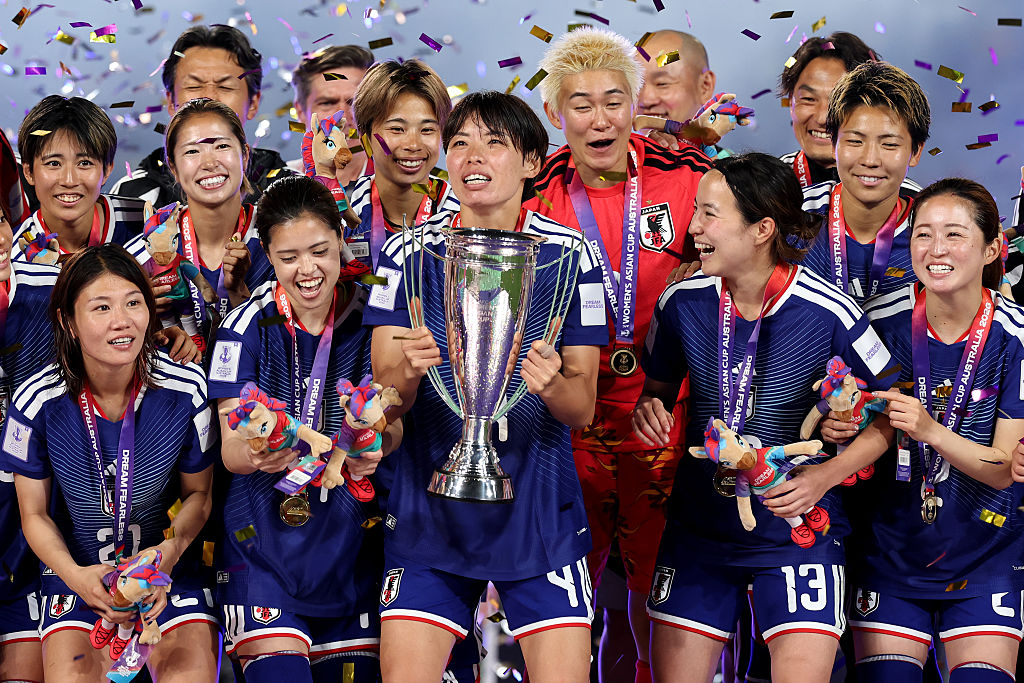 Japan hold the AFC Women's Asian Cup trophy aloft after winning the AFC Women's Asian Cup Australia 2026 match between Australia Matildas and Japan
