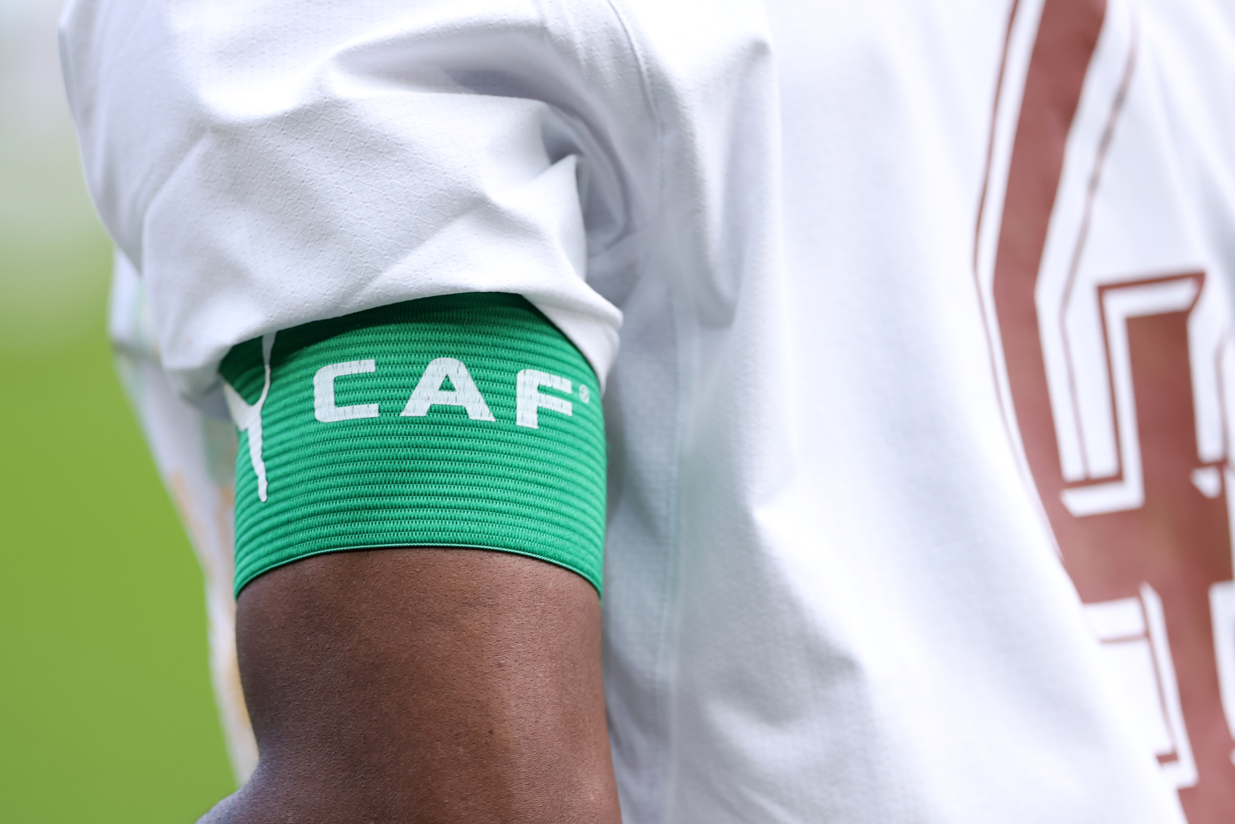 CAF captain armband displayed.