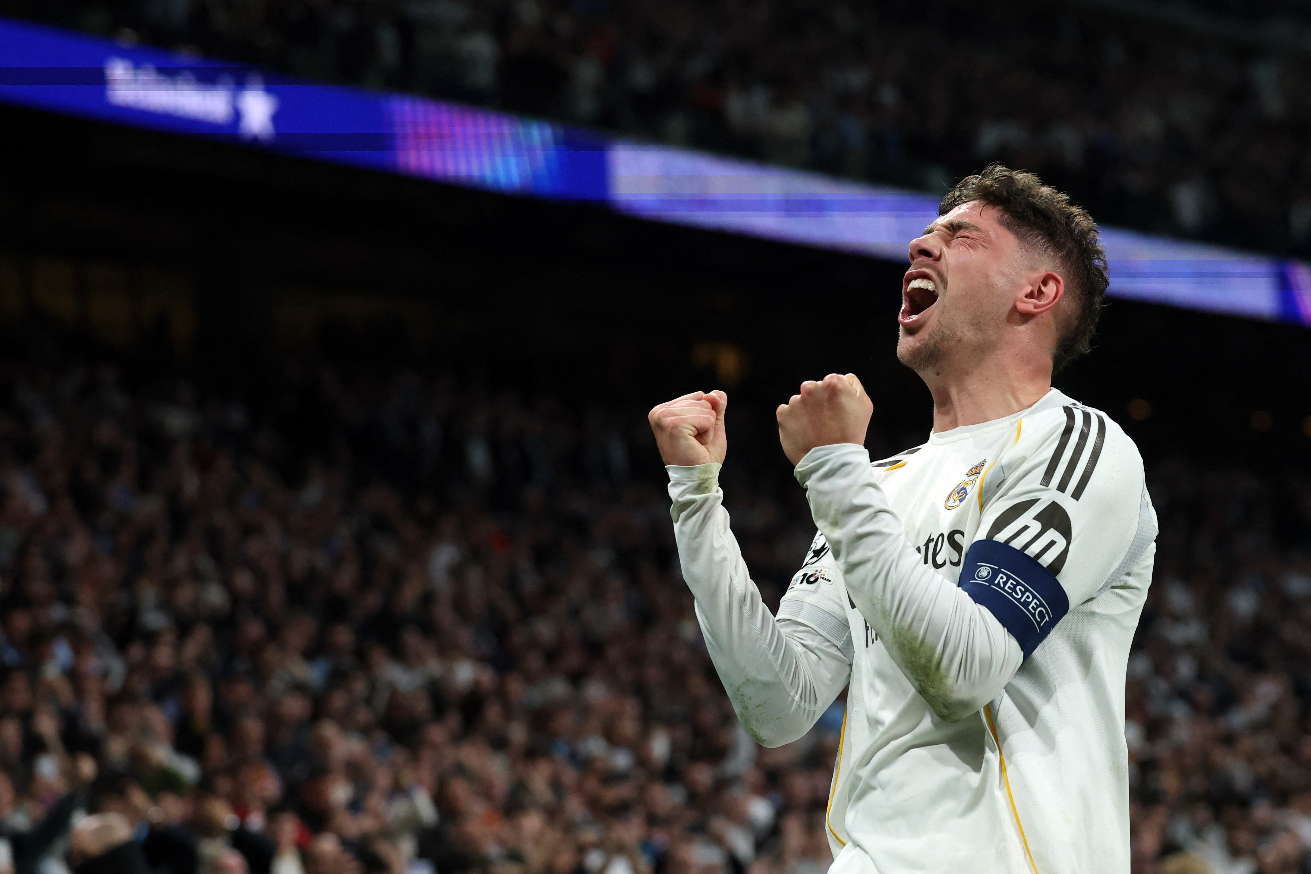 Real Madrid's Uruguayan midfielder #08 Federico Valverde celebrates scoring the opening goal during the UEFA Champions League last 16 first leg football match between Real Madrid CF and Manchester City at Santiago Bernabeu Stadium in Madrid on March 11, 2026.