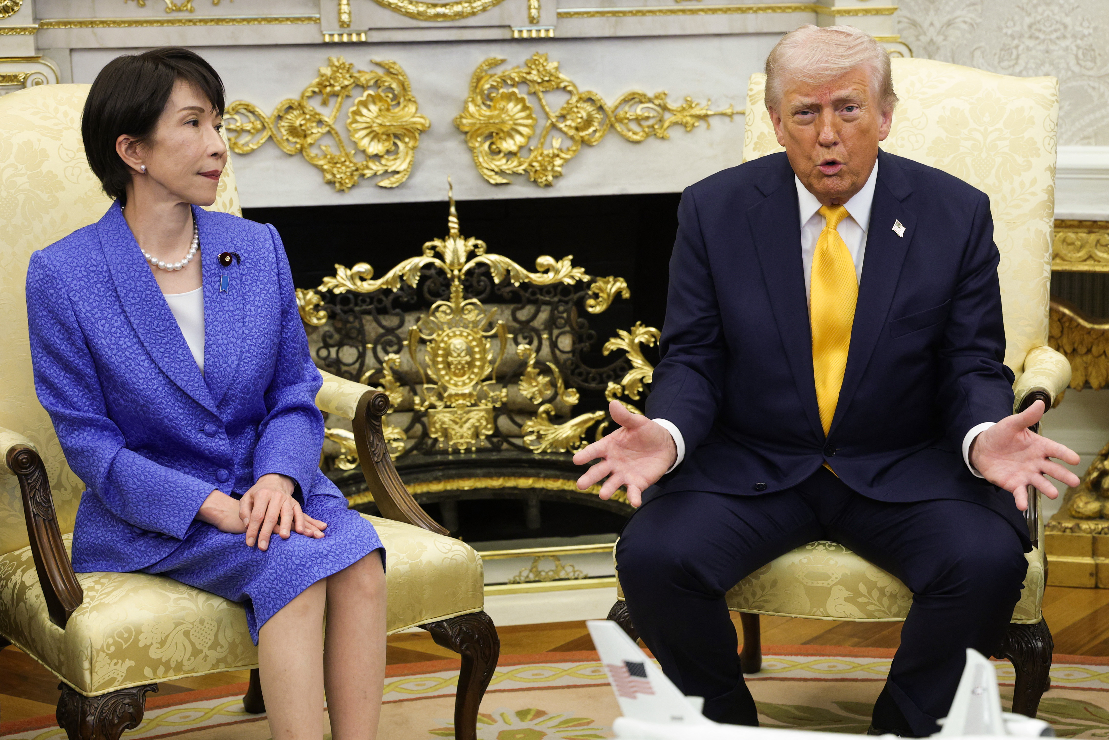 WASHINGTON, DC - MARCH 19: Prime Minister of Japan Sanae Takaichi (L) meets with U.S. President Donald Trump during a bilateral meeting in the Oval Office of the White House on March 19, 2026 in Washington, DC. The two leaders are expected to discuss topics including the current conflict in Iran and the threat that is posed by China. Alex Wong/Getty Images/AFP (Photo by ALEX WONG / GETTY IMAGES NORTH AMERICA / Getty Images via AFP)