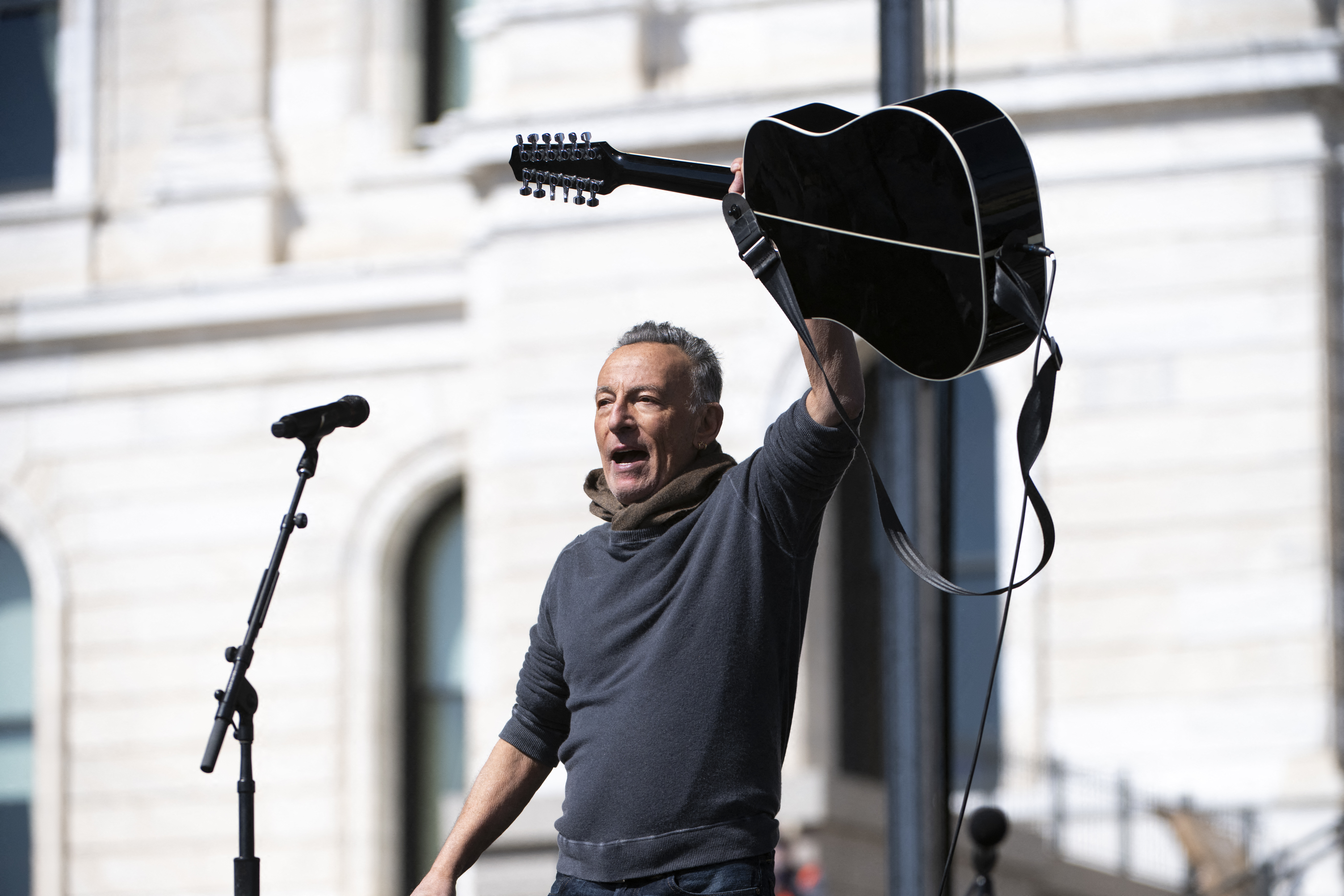 ST PAUL, MINNESOTA - MARCH 28: Musician Bruce Springsteen performs during a "No Kings" protest outside the State Capitol building on March 28, 2026 in St Paul, Minnesota. This is the third nationwide "No Kings" protest held against the Trump administration. Stephen Maturen/Getty Images/AFP (Photo by Stephen Maturen / GETTY IMAGES NORTH AMERICA / Getty Images via AFP)