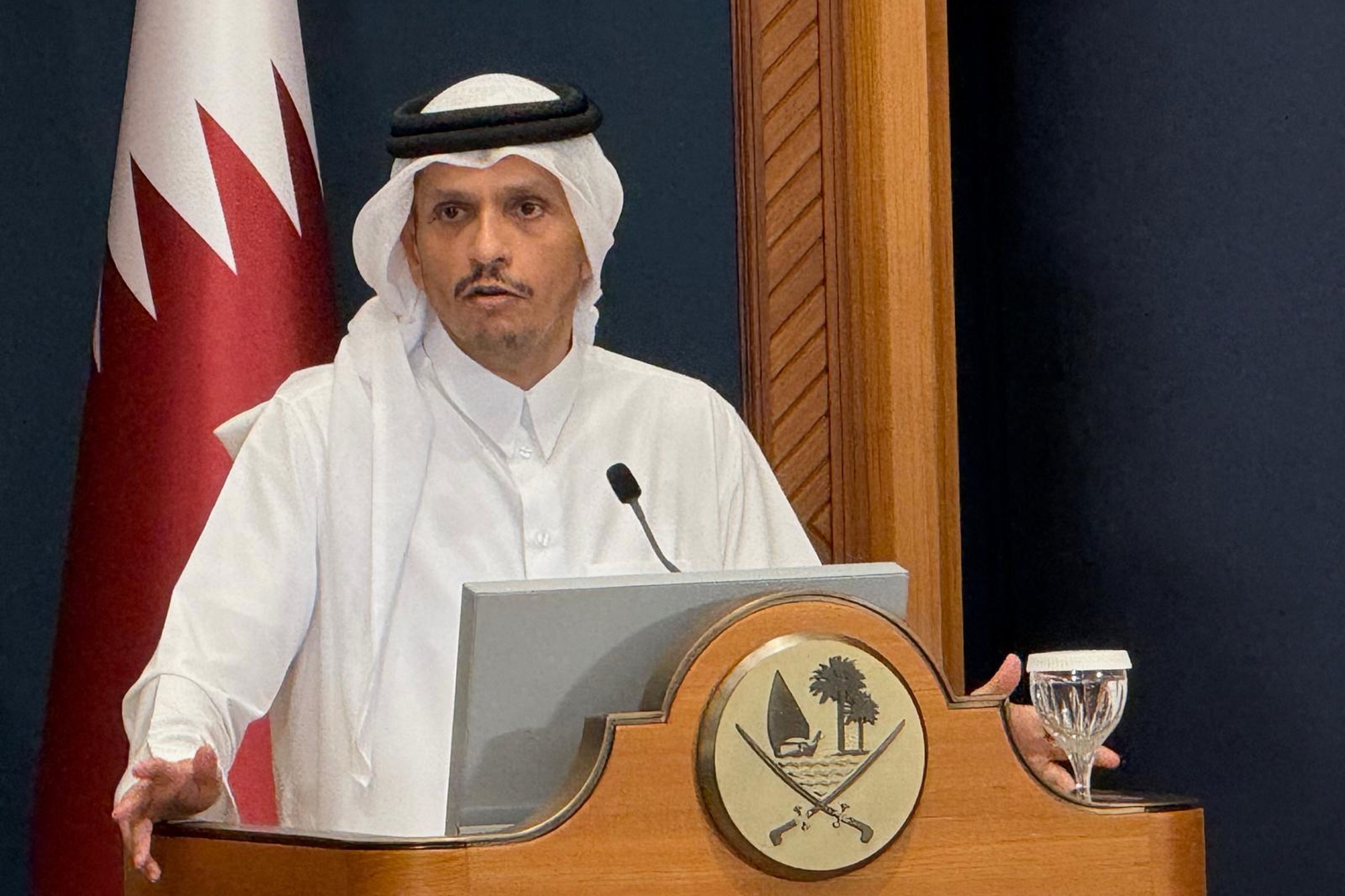 Qatar's Prime Minister and Foreign Minister Sheikh Mohammed bin Abdulrahman Al Thani speaks during a joint press conference with Turkey's Foreign Minister Hakan Fidan in Doha, Qatar, Thursday, March 19, 2026. (AP Photo/Najib Abu Jobain)