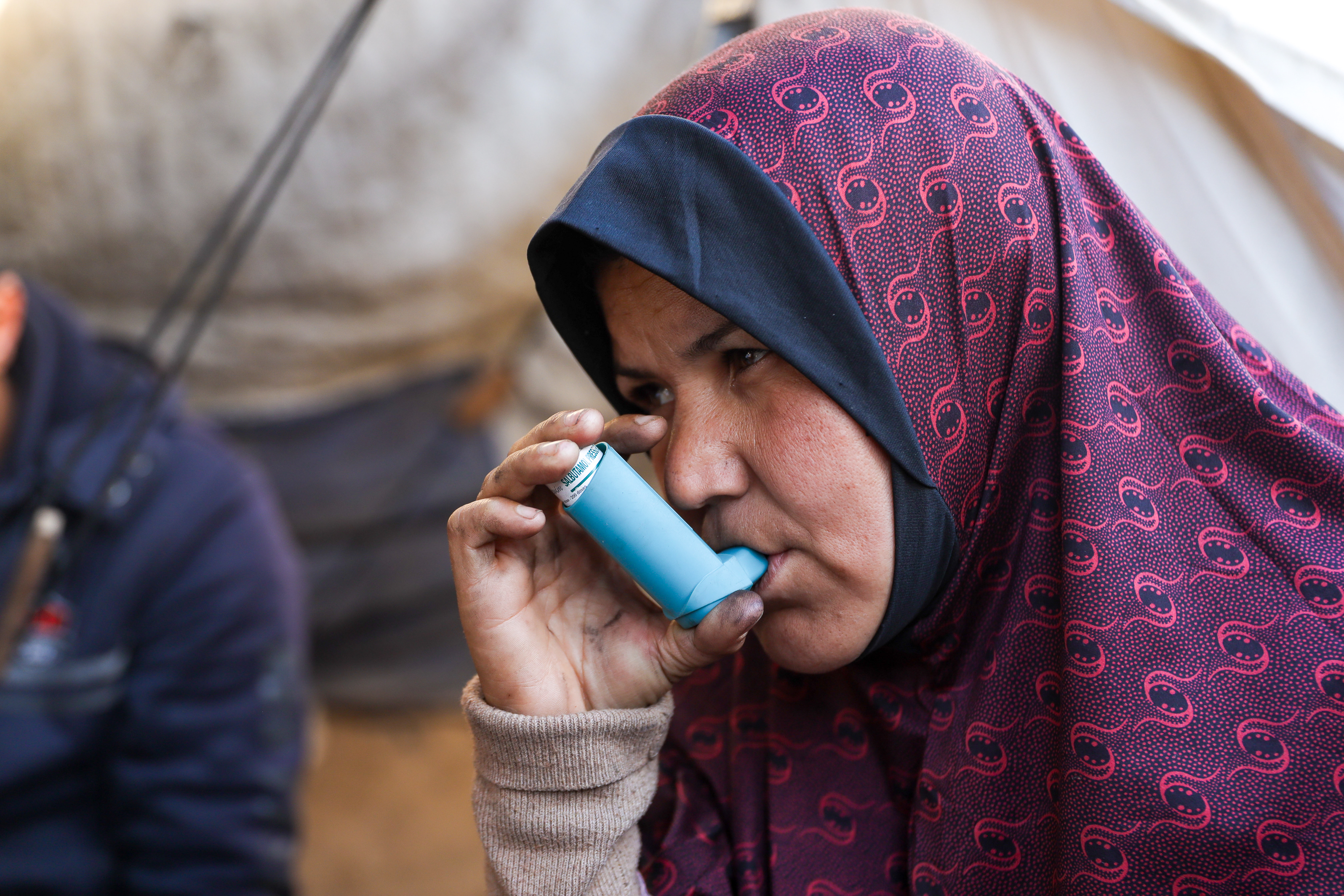 Islam Dardouna suffers from respiratory problems that have worsened significantly due to constant exposure to wood smoke and relies regularly on asthma inhalers