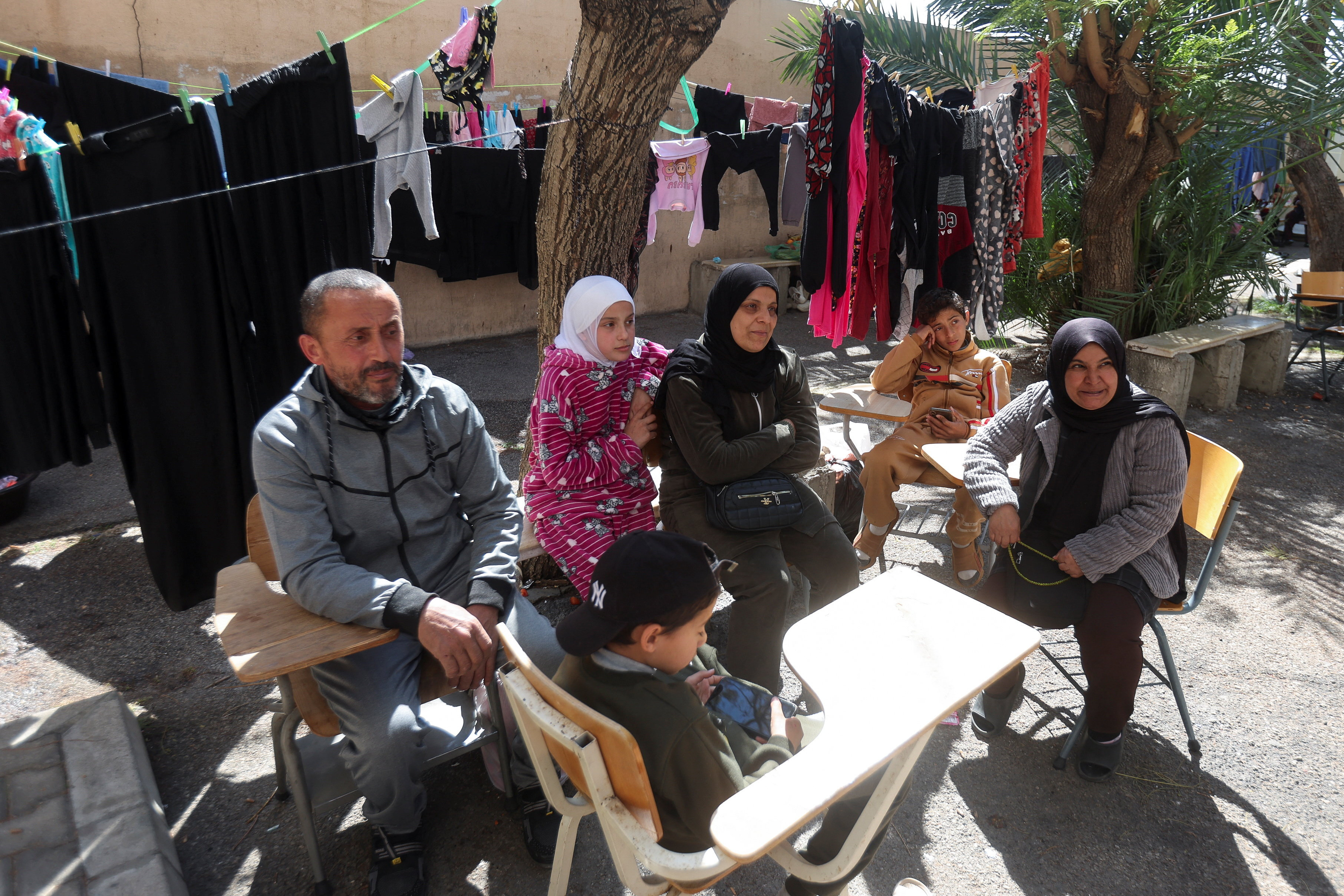 Displaced people take shelter inside a school in Sidon, Lebanon, March 11, 2026, following an escalation between Hezbollah and Israel amid the U.S.-Israeli conflict with Iran. REUTERS/Aziz Taher