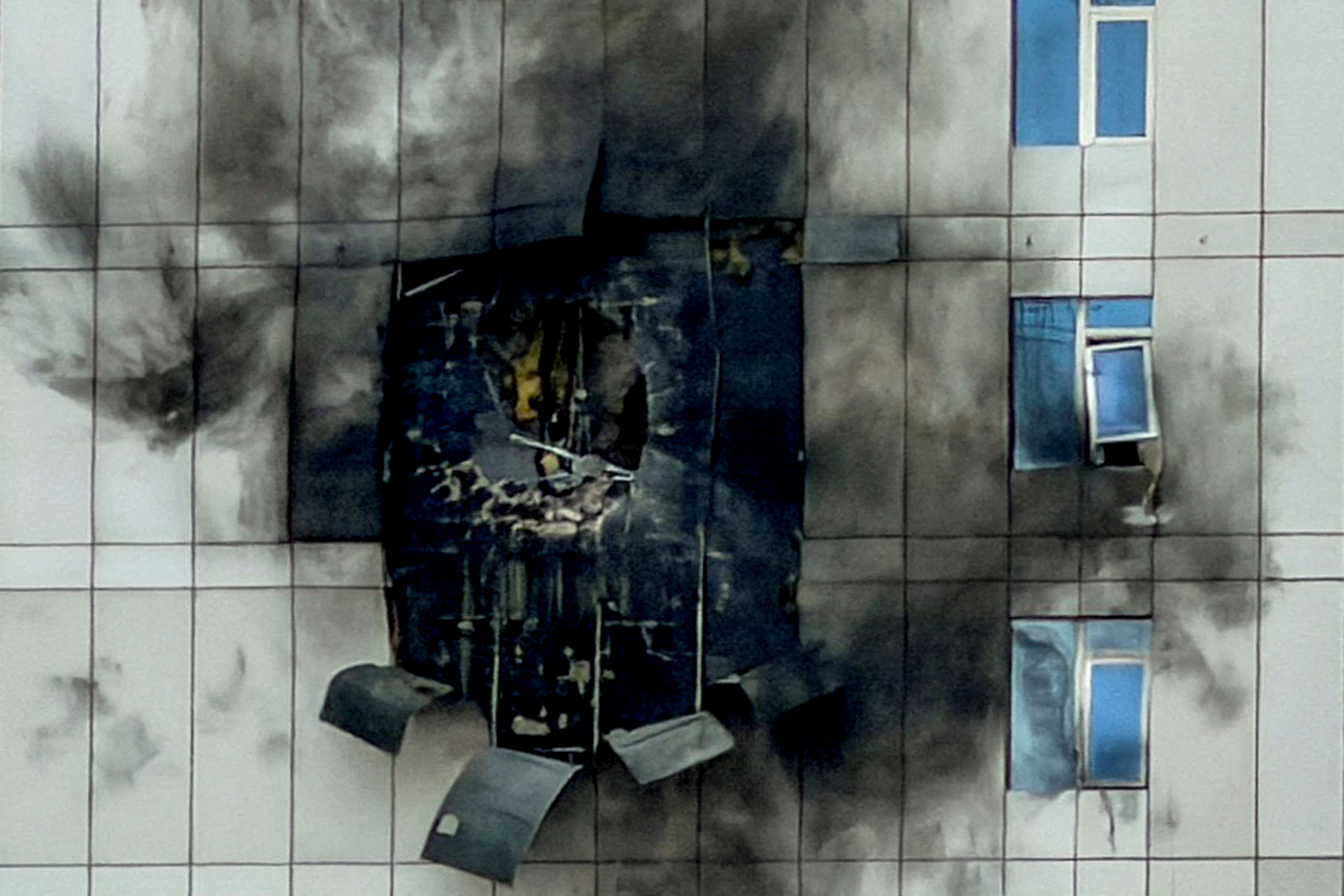 A building damaged by an Iranian drone attack in Manama, Bahrain