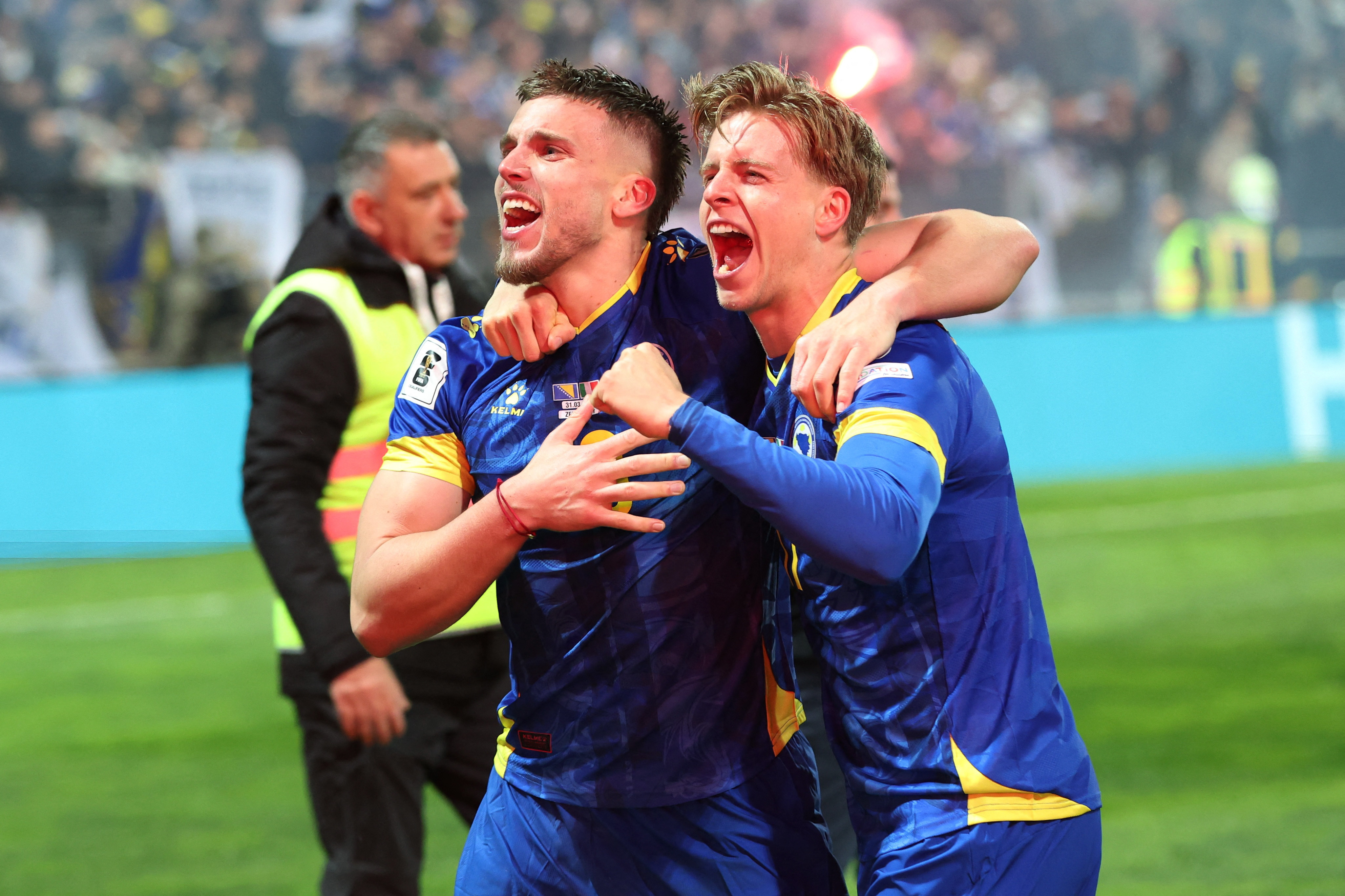 Soccer Football - FIFA World Cup - UEFA Qualifiers - Finals - Bosnia and Herzegovina v Italy - Bilino Polje Stadium, Zenica, Bosnia and Herzegovina - March 31, 2026 Bosnia and Herzegovina's Ermedin Demirovic and Dzenis Burnic celebrate qualifying for the FIFA World Cup REUTERS/Amel Emric