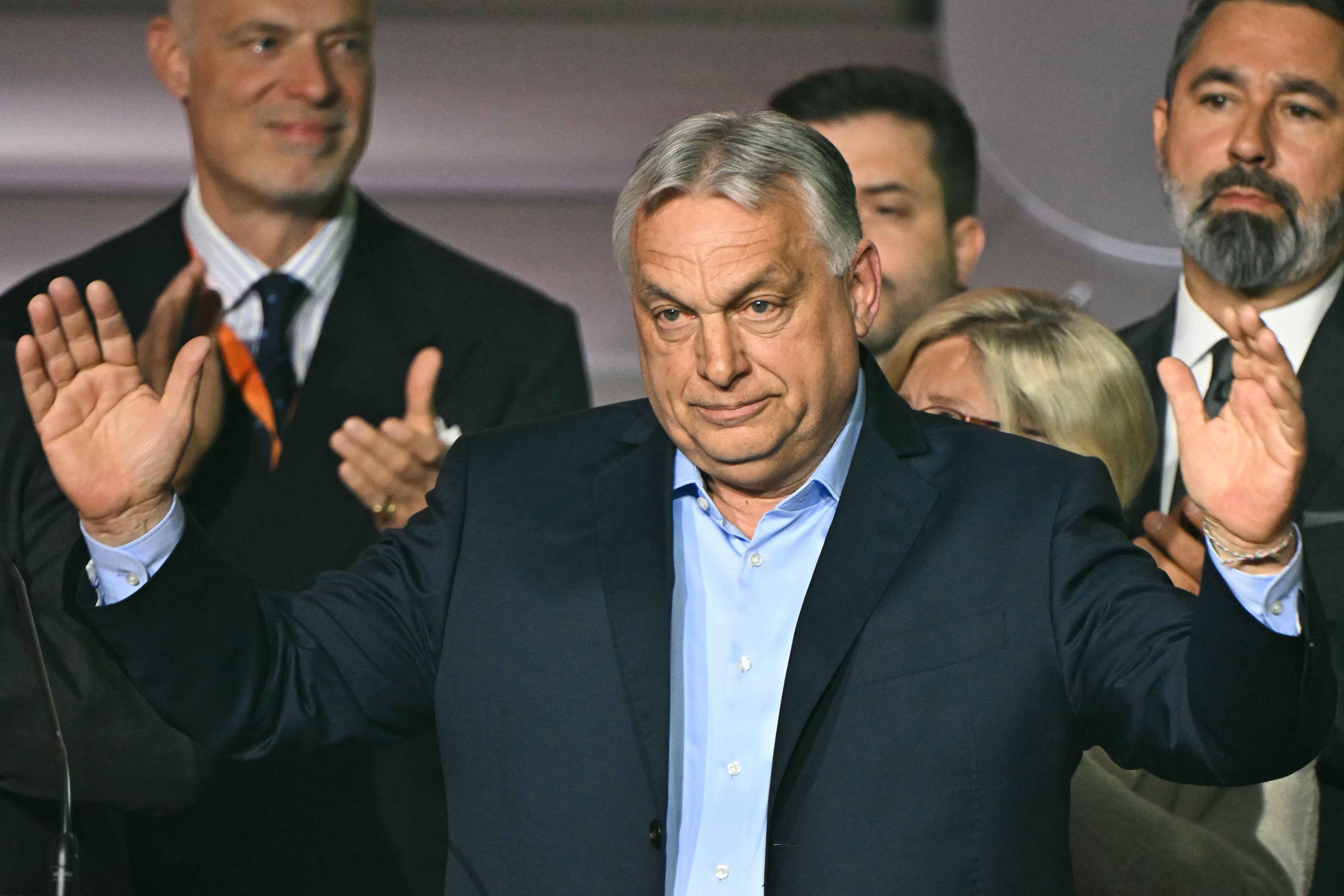 Hungarian Prime Minister Viktor Orban waves to supporters at the Balna centre in Budapest during Hungary's general election on April 12, 2026