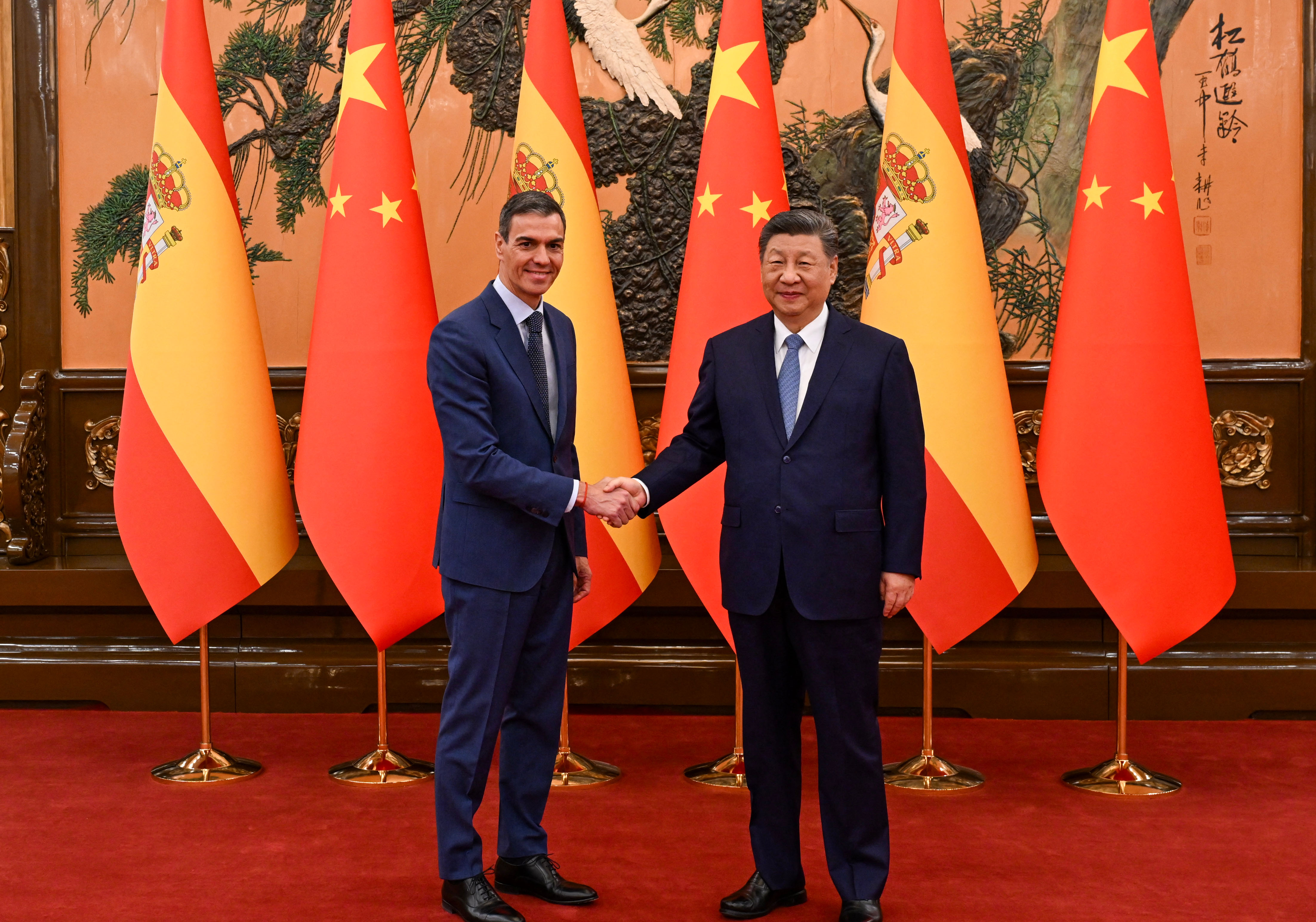 In this handout photo taken and released on April 14, 2026 by the Spanish Prime Minister's office La Moncloa, China's President Xi Jinping shakes hands with Spain's Prime Minister Pedro Sanchez in Beijing. [Borja Puig de la Bellacasa/La Moncloa via AFP]