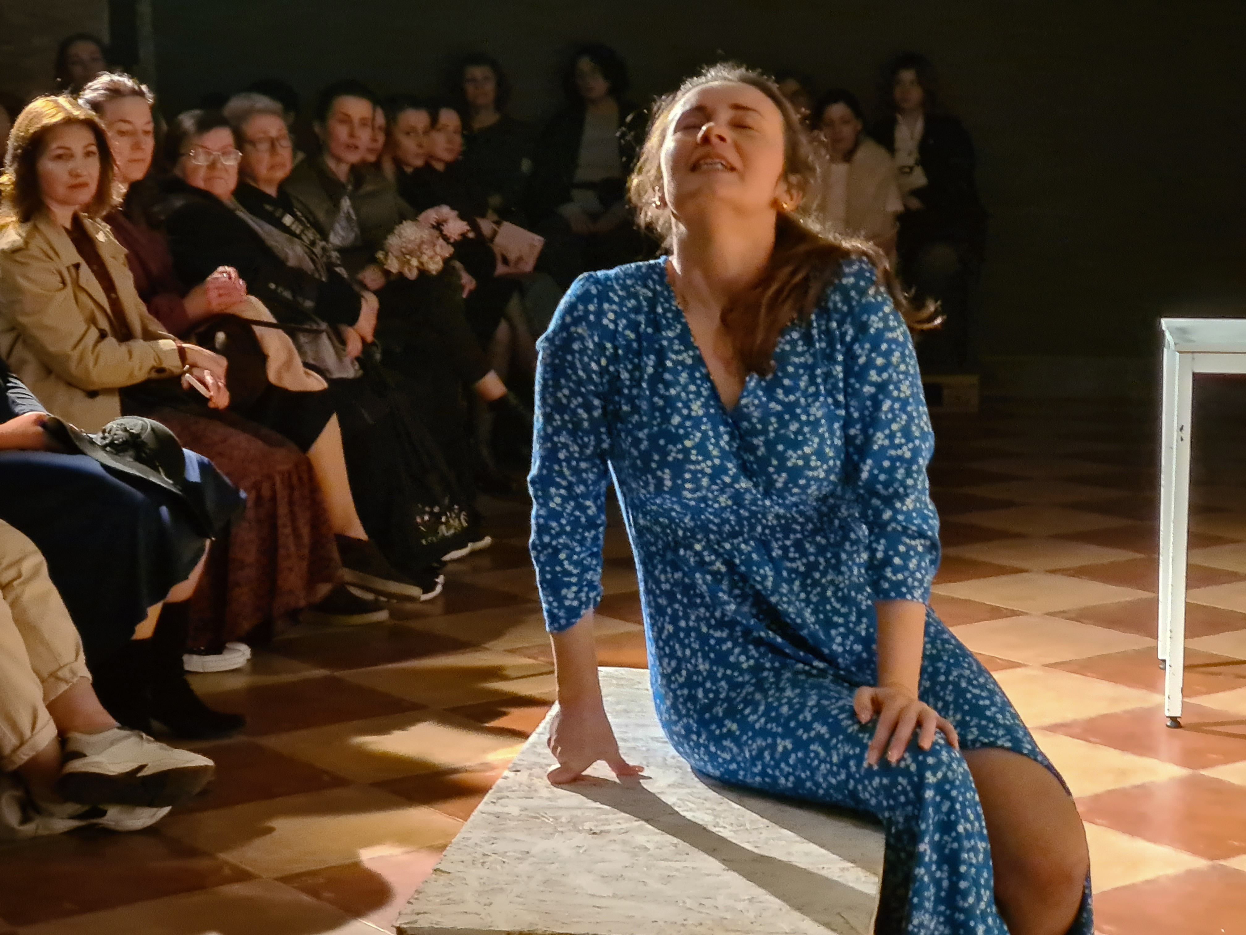 Actress Kateryna Svyrydenko plays Maryna, a soldier's wife in Twenty One, a play staged in Kyiv's Veterans' Theater [Mansur Mirovalev/Al Jazeera]