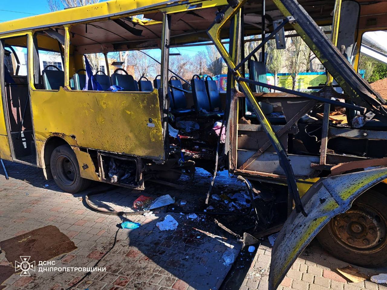 A wrecked city bus following a drone attack in Ukraine's Nikopol city