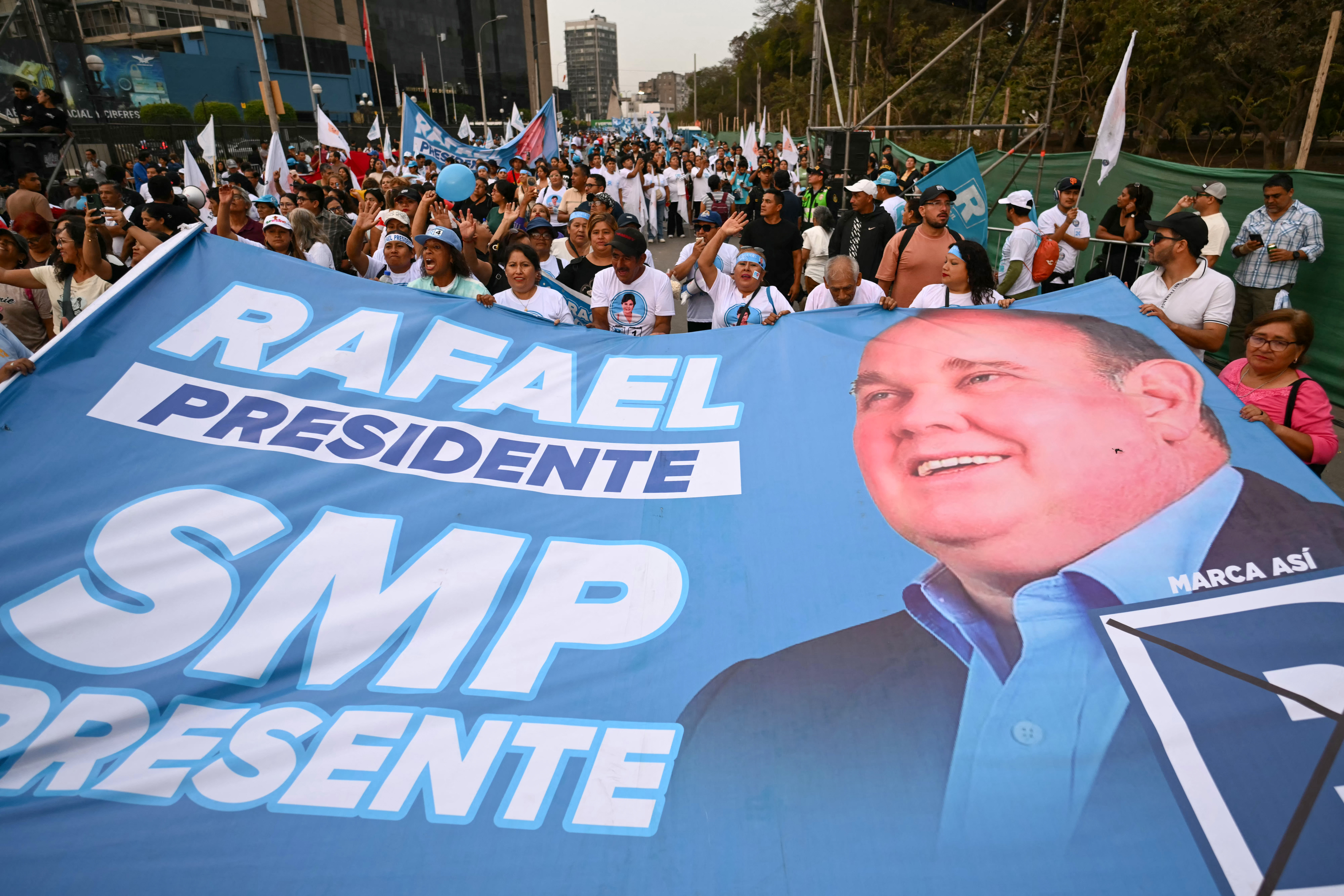 Supporters of Peru's presidential candidate Rafael Lopez Aliaga, for the Renovacion Popular party, gather for his closing campaign rally in Lima on April 9, 2026.