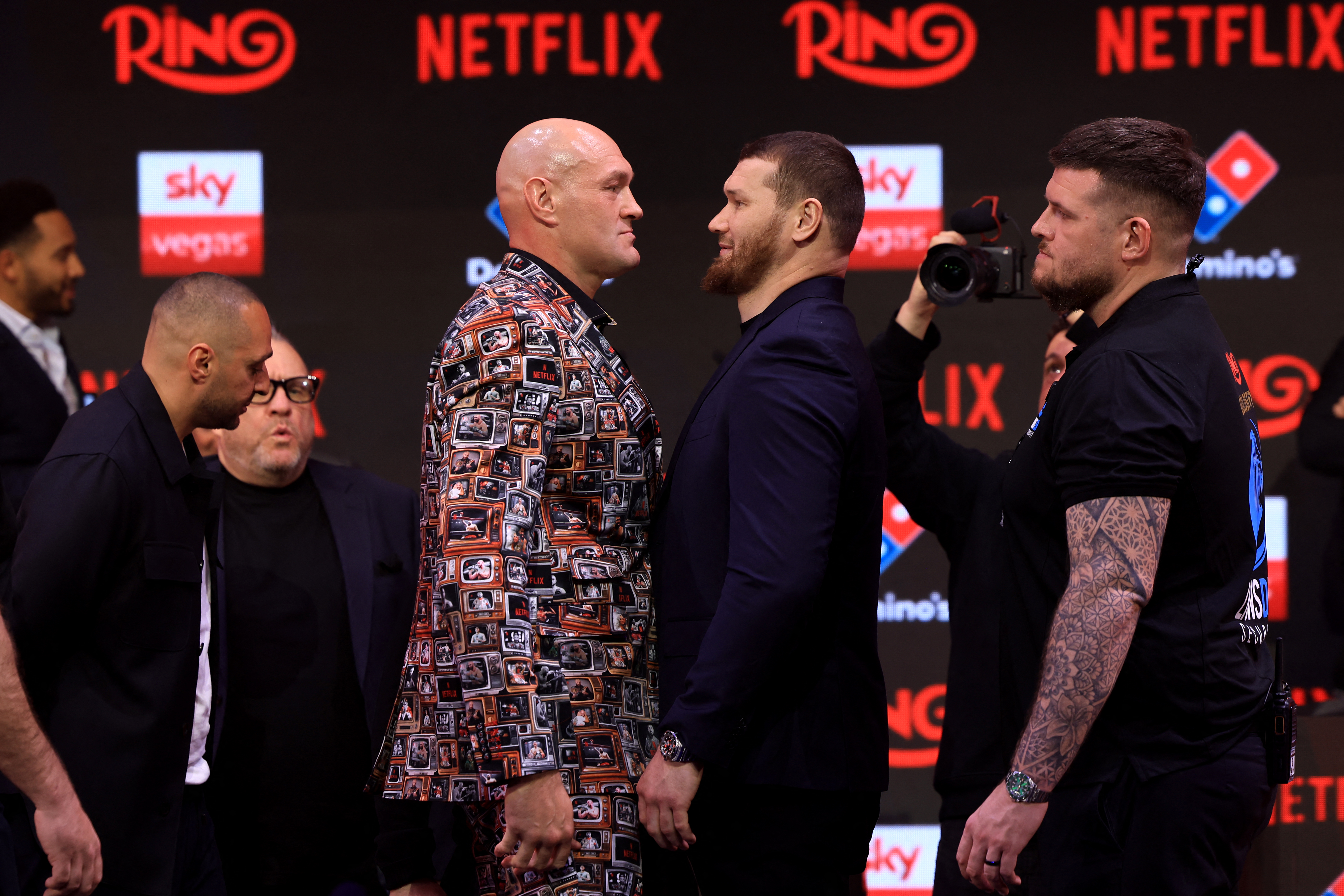 Britain's two-time former world heavyweight champion Tyson Fury (L) faces off with Russia's Arslanbek Makhmudov during a press conference in central London on April 9, 2026, ahead of their heavyweight boxing match on April 11. (Photo by Toby Shepheard / AFP)