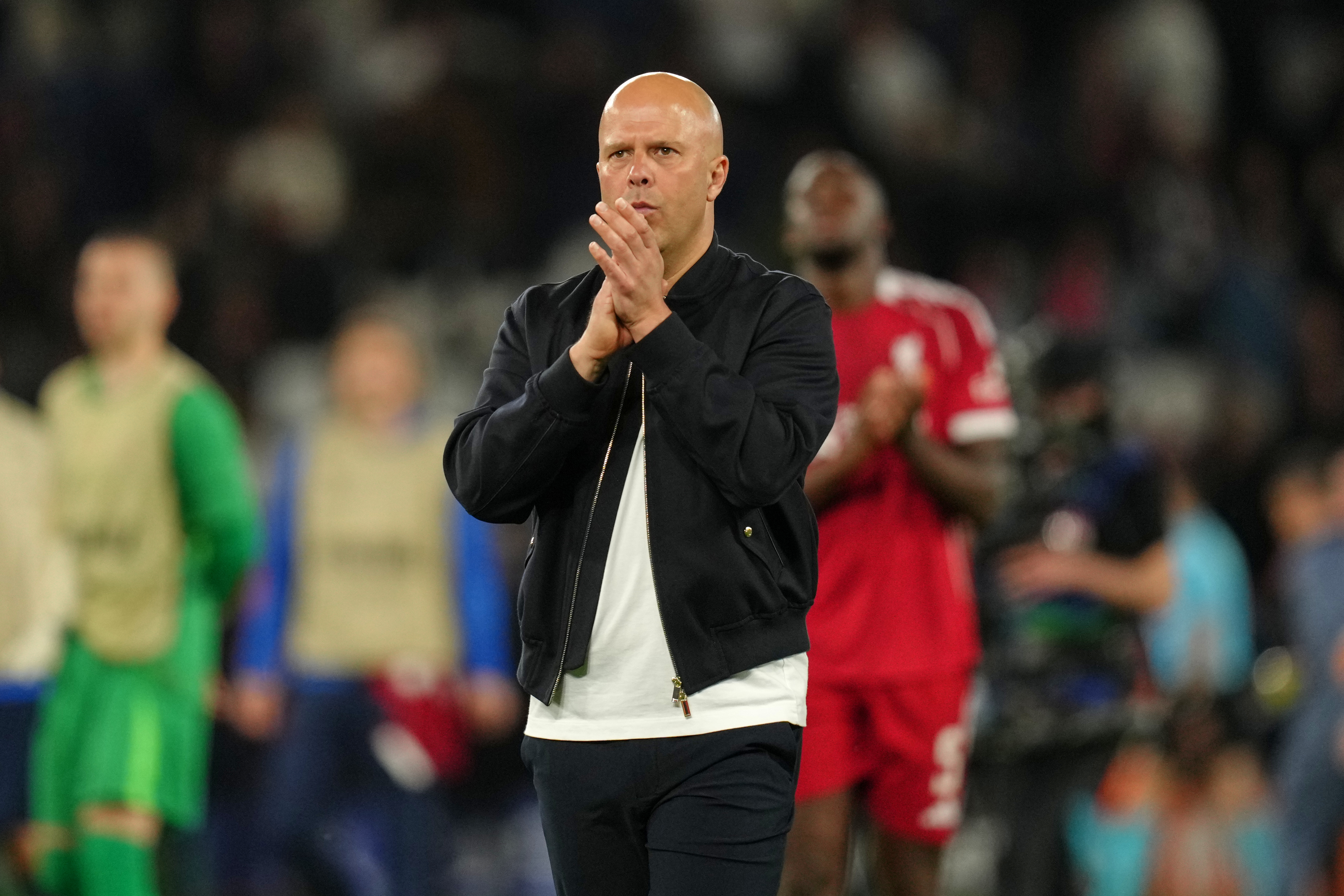 Liverpool's manager Arne Slot applauds fans after the Champions League quarterfinal first leg soccer match between Paris Saint-Germain and Liverpool in Paris, Wednesday, April 8, 2026. (AP Photo/Aurelien Morissard)